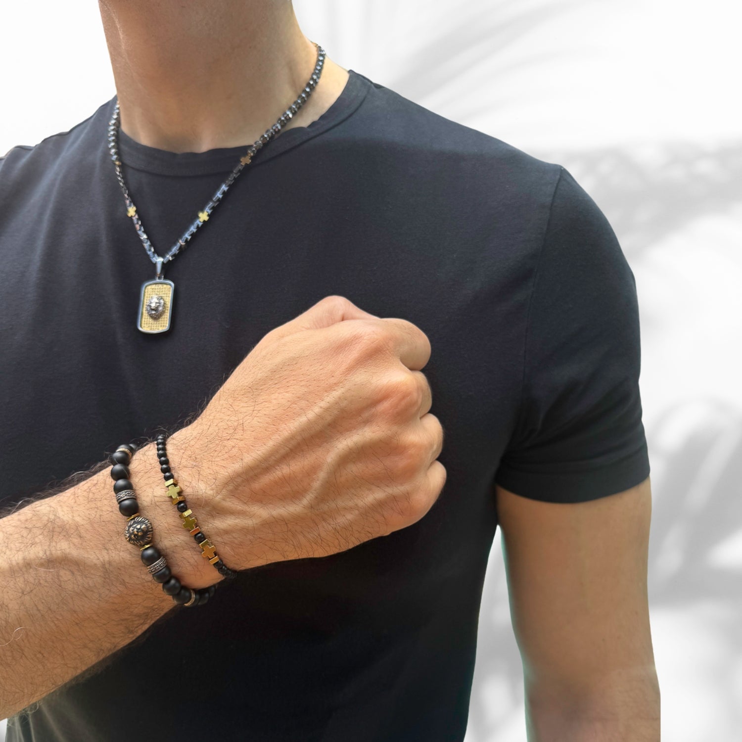 Elegant beaded bracelet with black onyx stones, gold hematite, and black Cz diamond centerpiece.