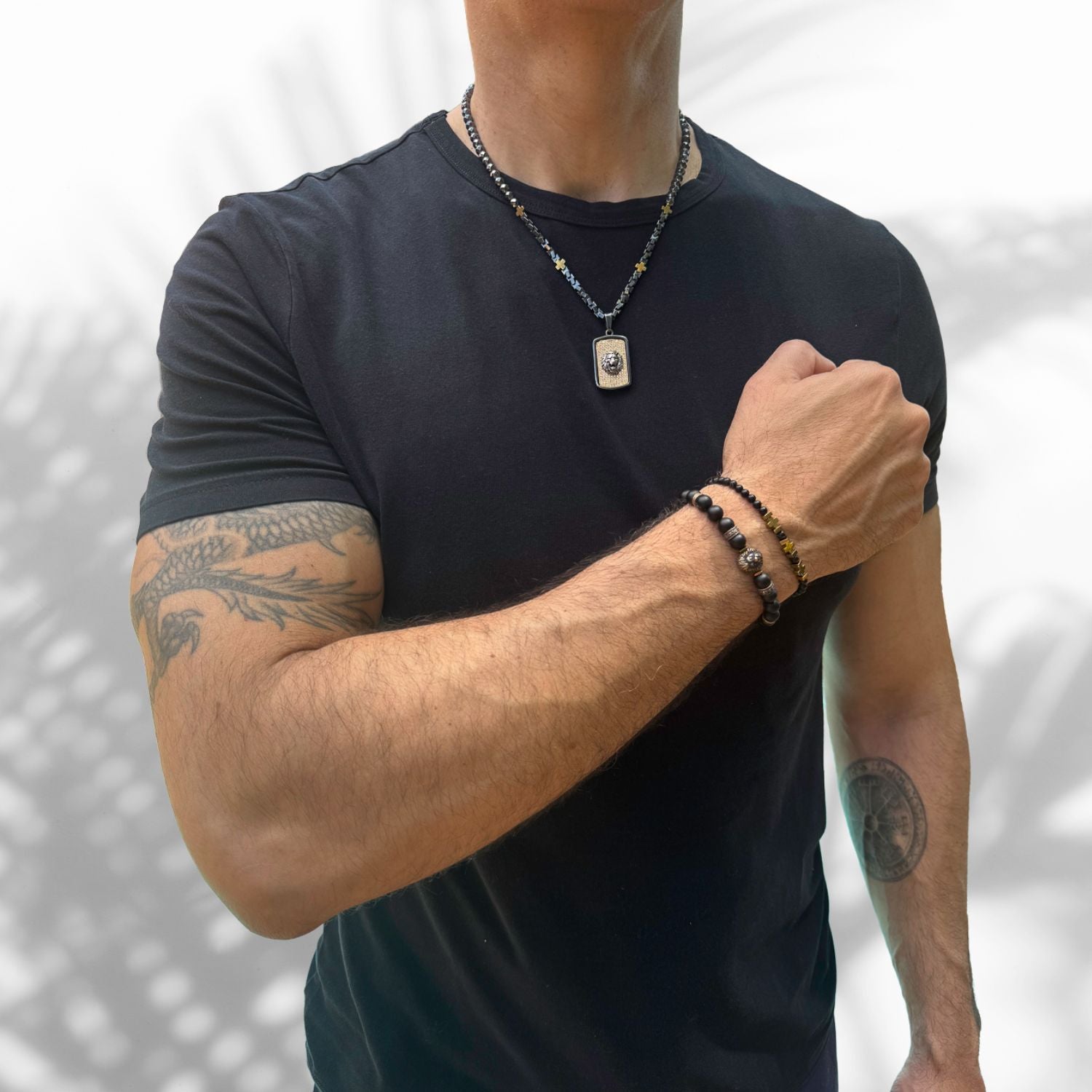 Elegant and Protective Black Onyx Bracelet for Men with an 8mm bead size and a regal bronze lion centerpiece