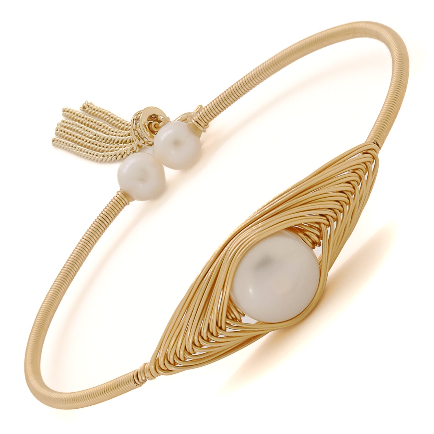 Lustrous pearls meet radiant gold in the Cleopatra Pearl Bangle Bracelet.