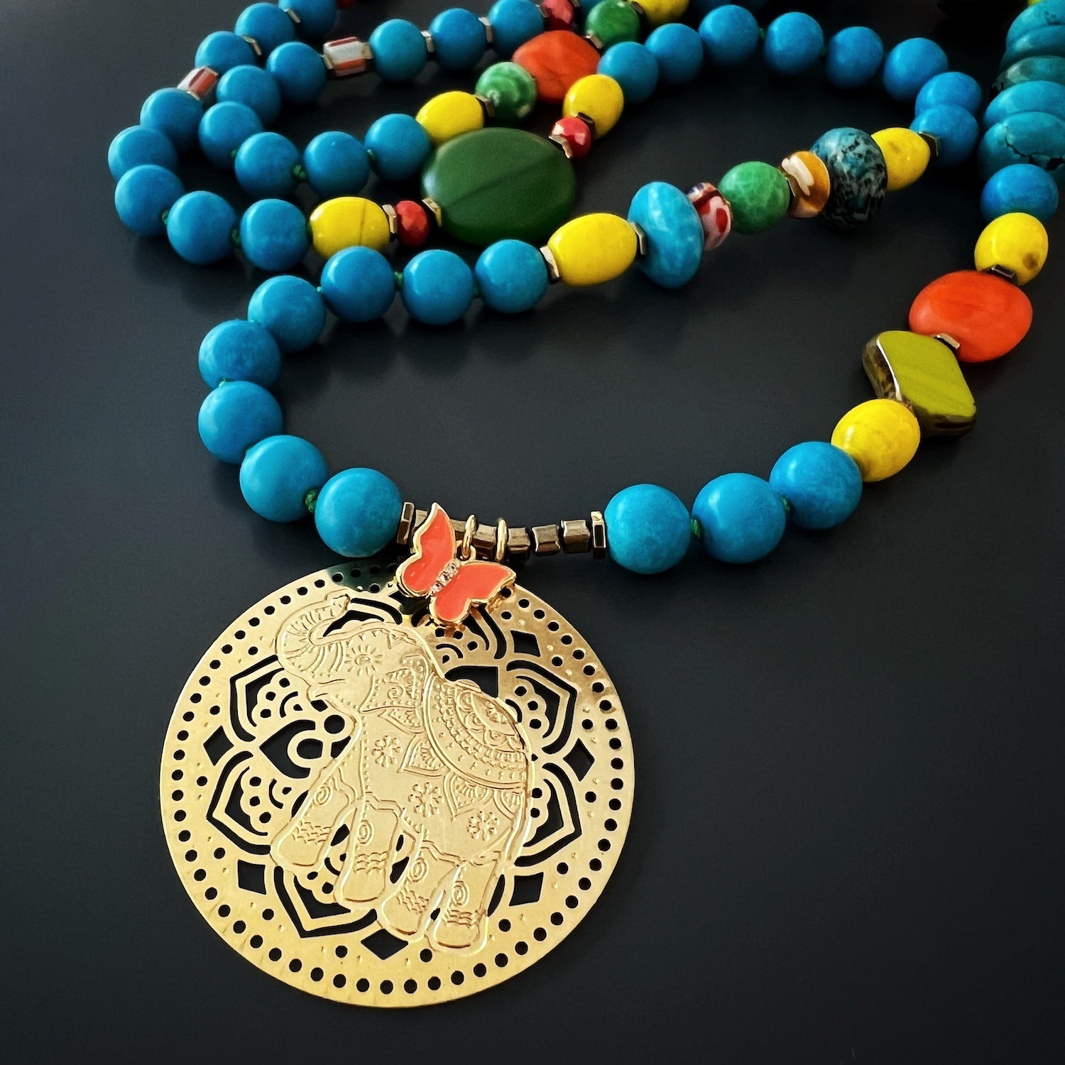 Embrace the playful and vibrant vibes of summer with the Colorful Therapy Elephant Turquoise Necklace. 