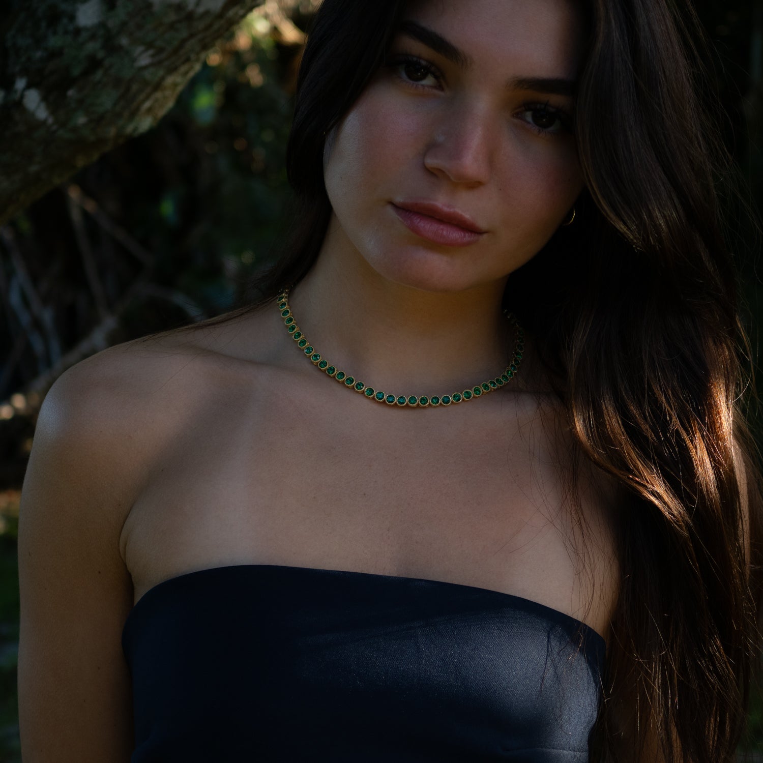 Elegant Emerald Tennis Necklace with Gold-Plated Bronze, a Statement of Wisdom and Prosperity