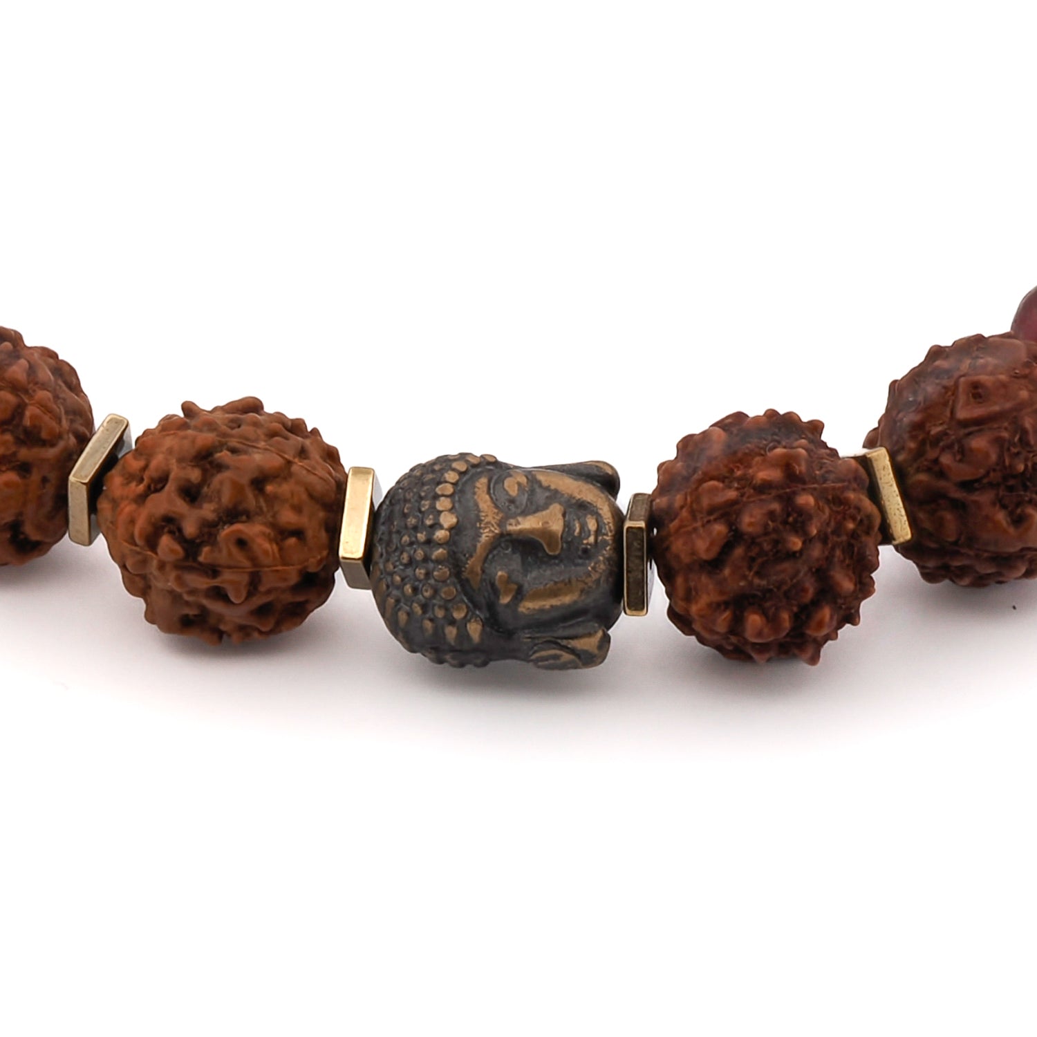 Grounding Tibet Rudraksha bead bracelet with gold hematite spacers and bronze Buddha accent