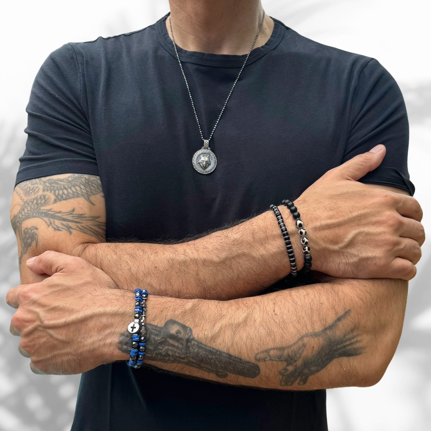 Stylish Beaded Bracelet Set with grounding hematite beads, blue lava rocks, and a sterling silver cross for spiritual guidance