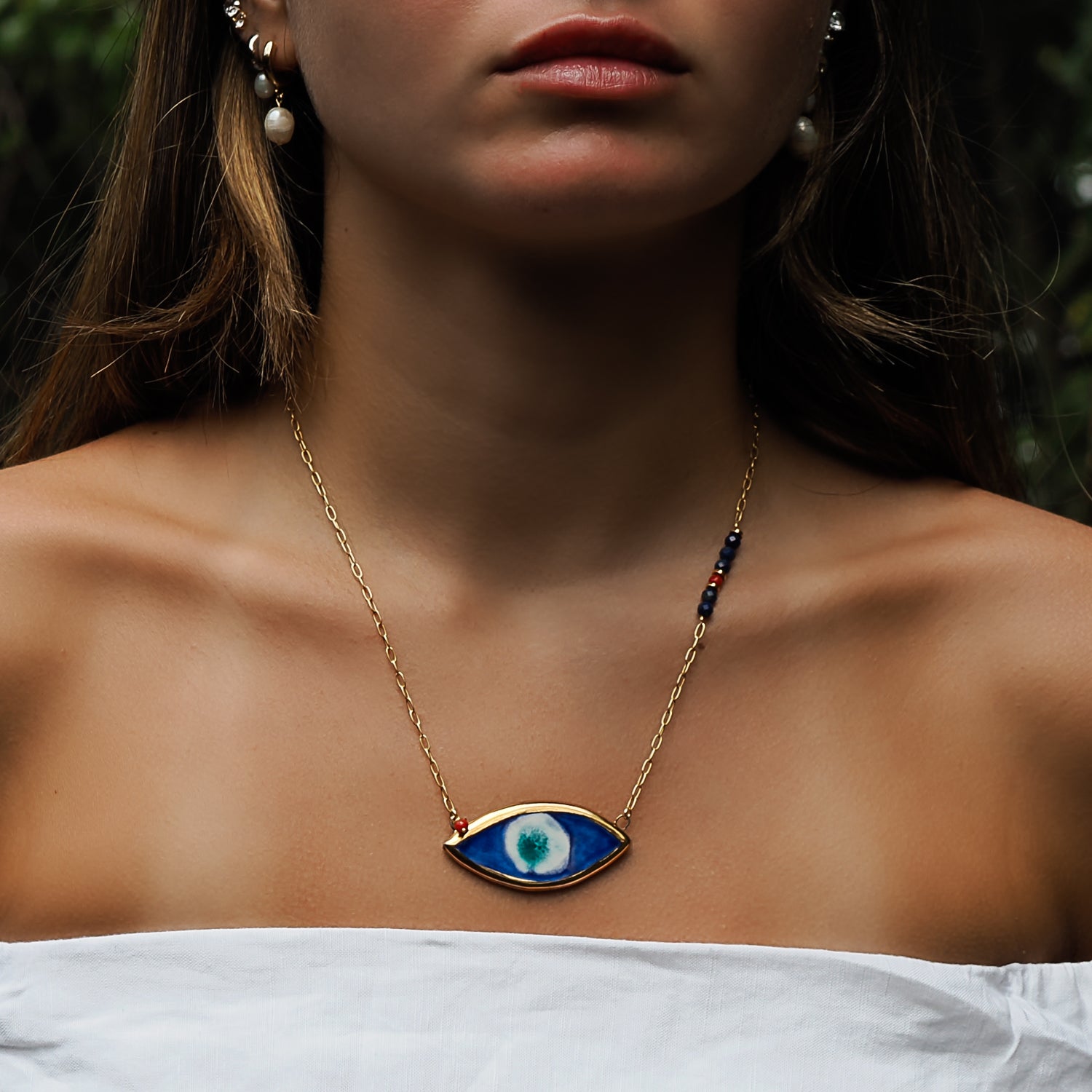 A Unique Statement - Model Enhances Personal Expression with the Pendant.