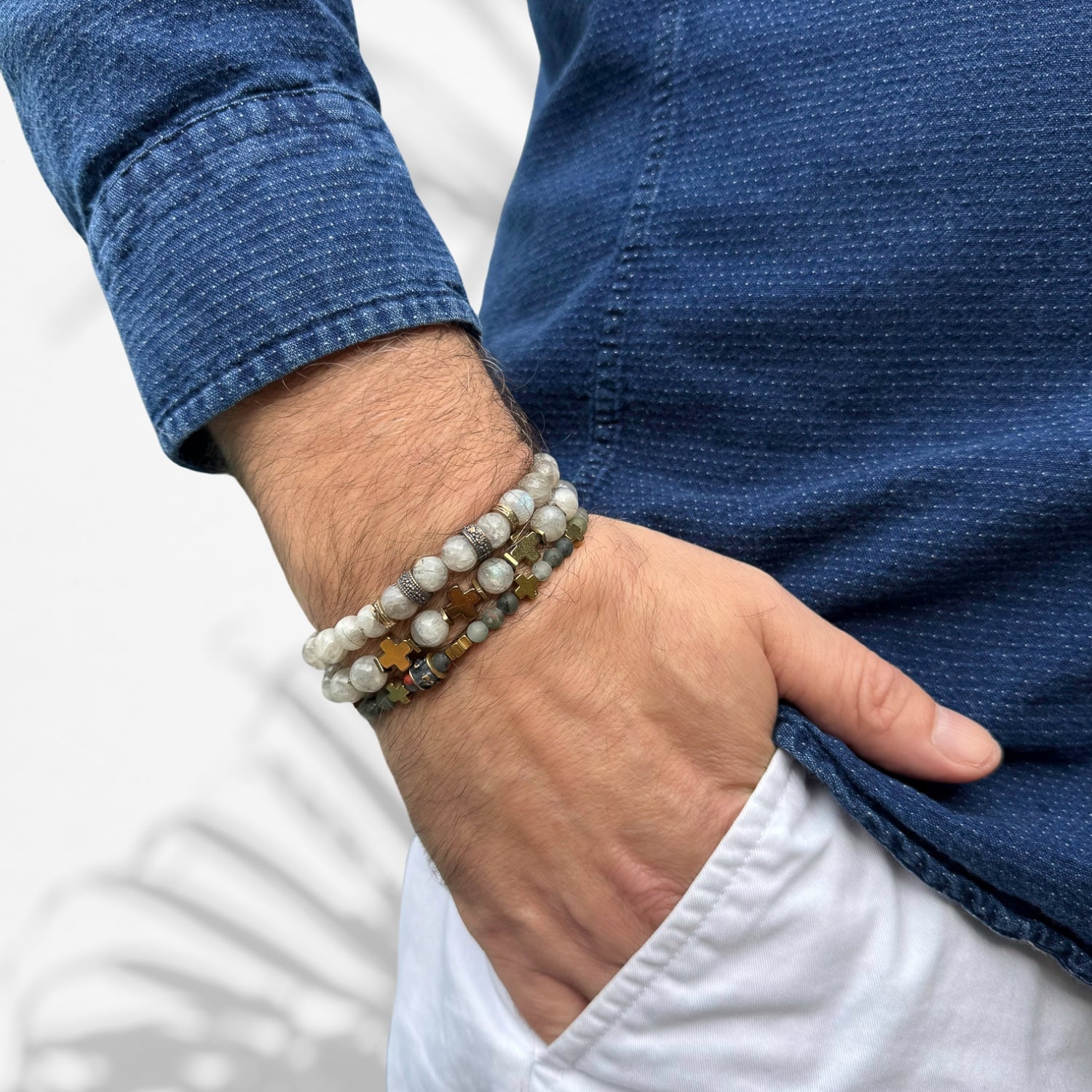 Serene Strength: Model Wearing Gold Cross Labradorite & Africa Bloodstone Bracelet Set