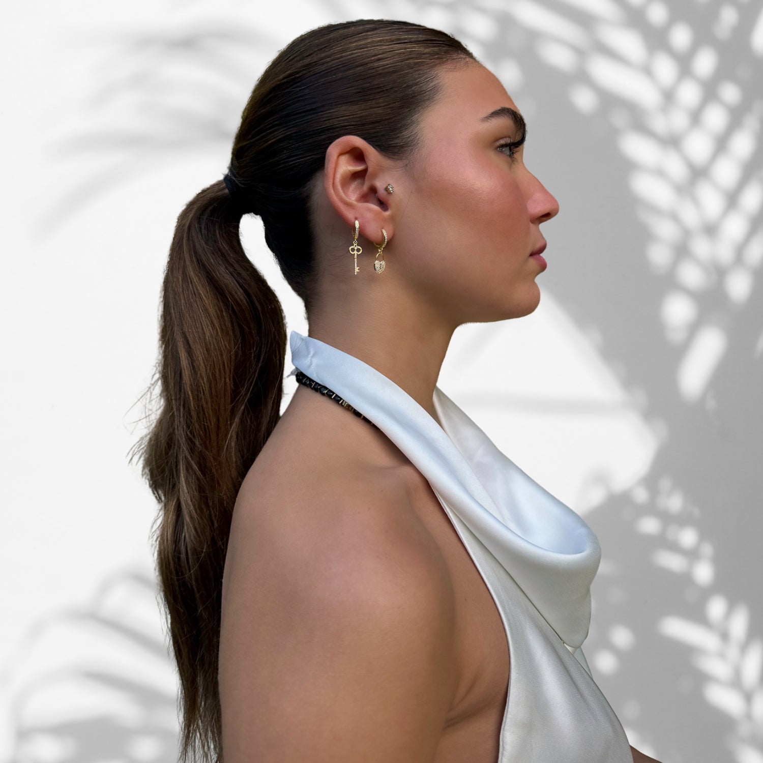 Stylish Model Wearing Everlasting Love Gold Plated Earrings