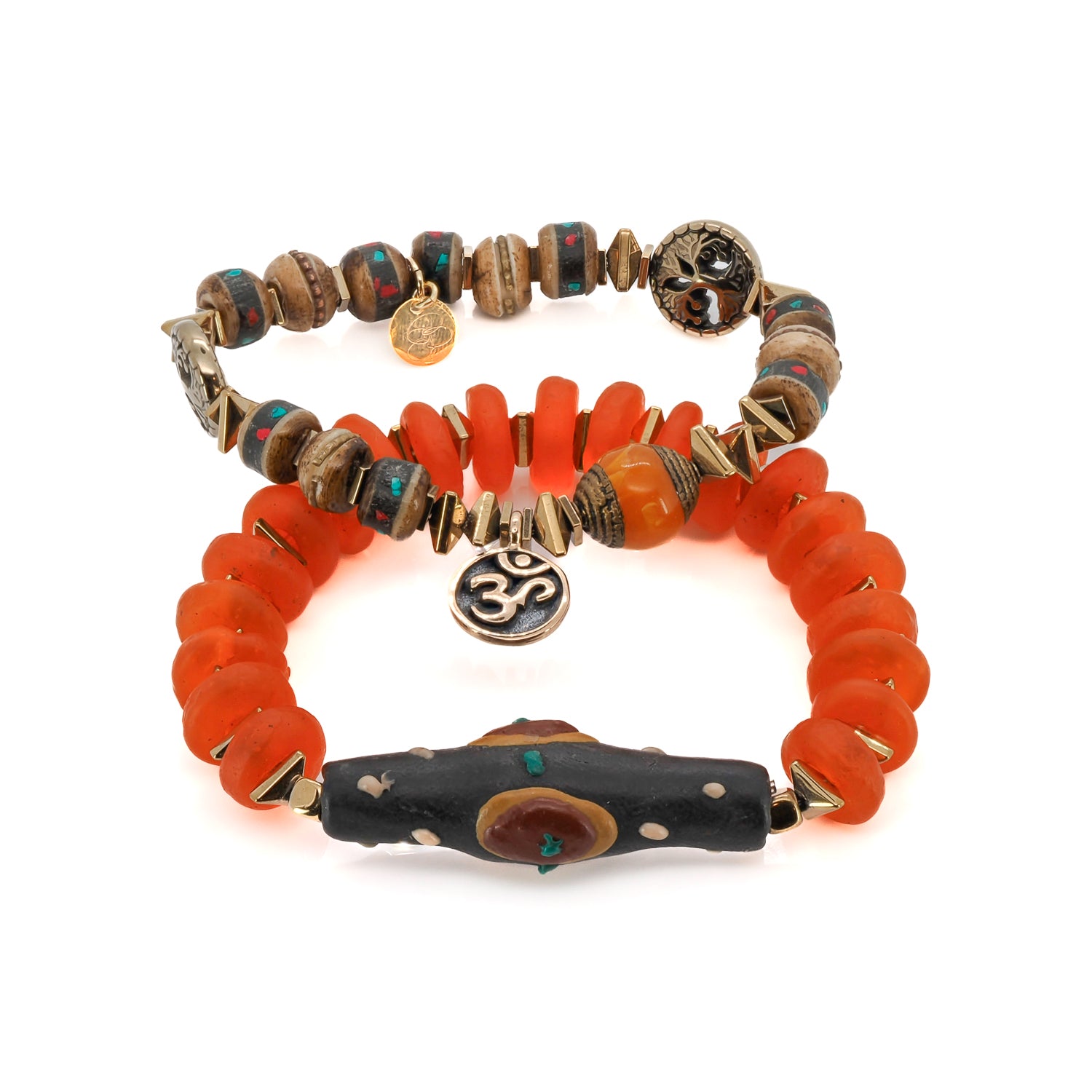 Mystic Nepal Om charm bracelet set with red African glass and gold hematite beads on white background