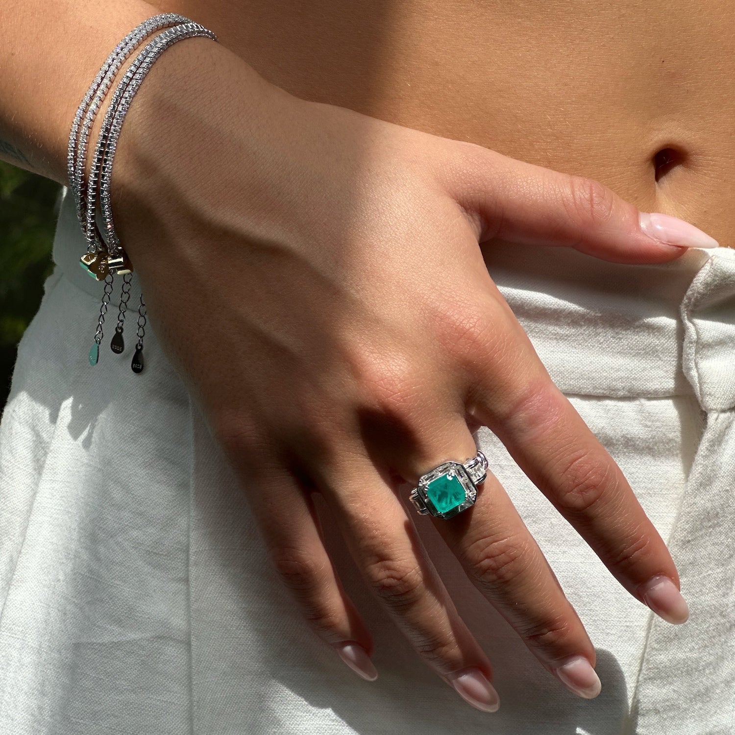 Exquisite Paraiba Tourmaline Ring on Model's Finger - Luxurious Elegance