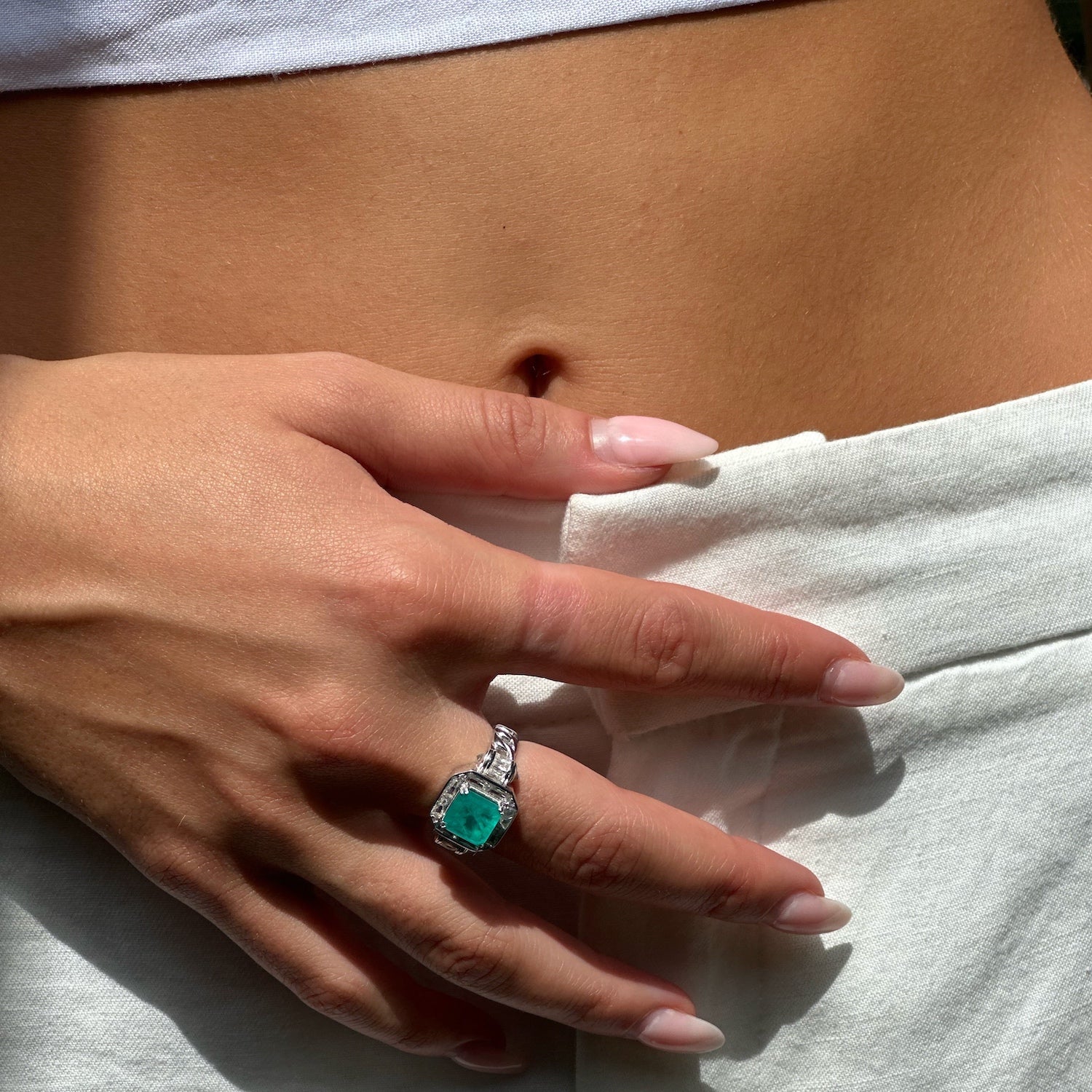 Captivating Paraiba Tourmaline Ring on Model&#39;s Hand - Unparalleled Beauty