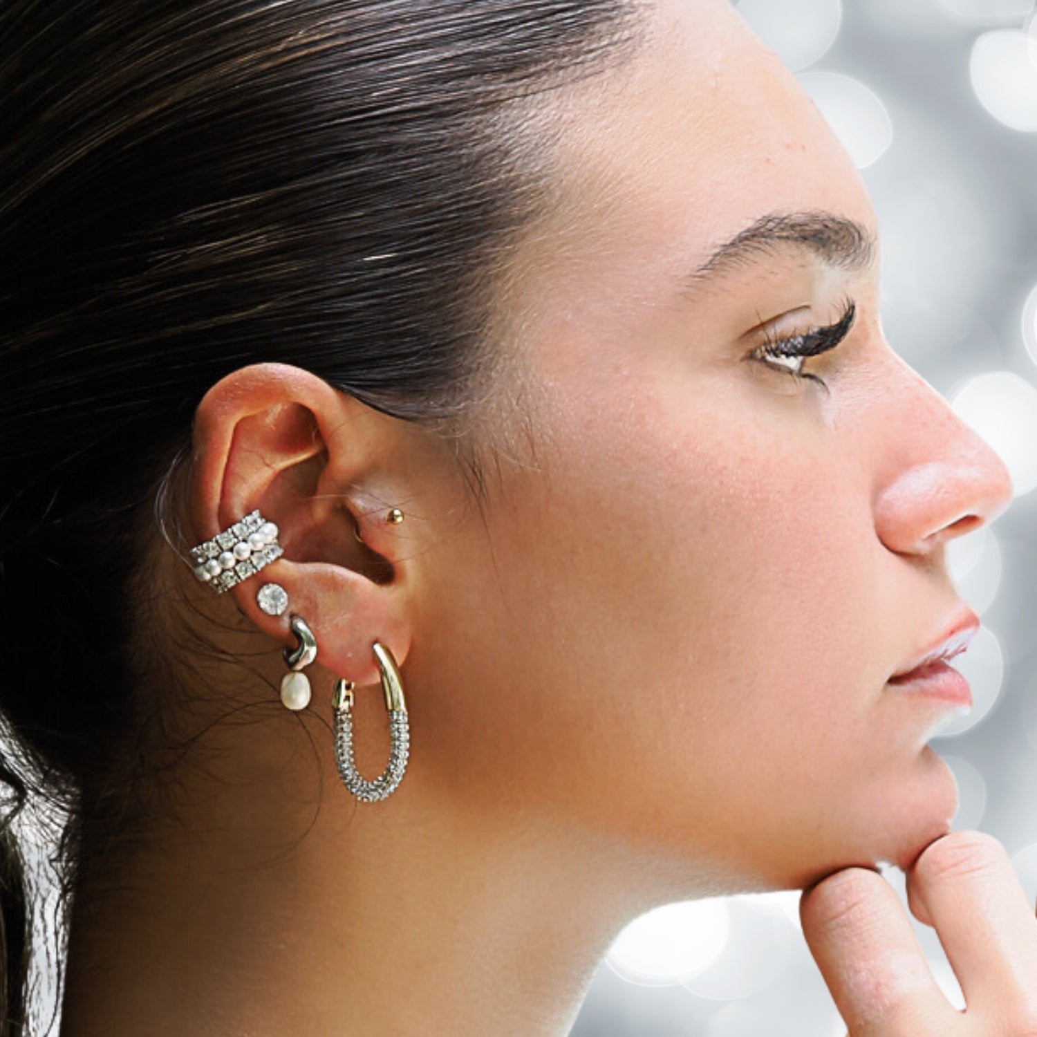 Elegant 18K gold-plated hoops featuring pave diamond accents