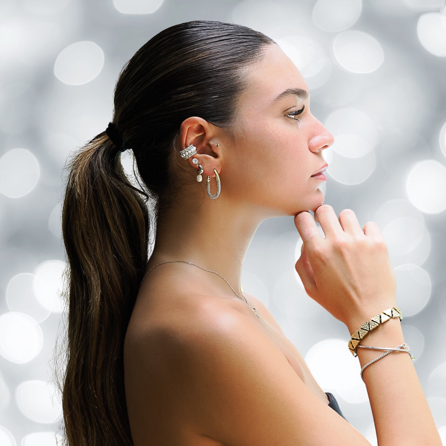 Luxurious gold hoop earrings adorned with pave diamonds