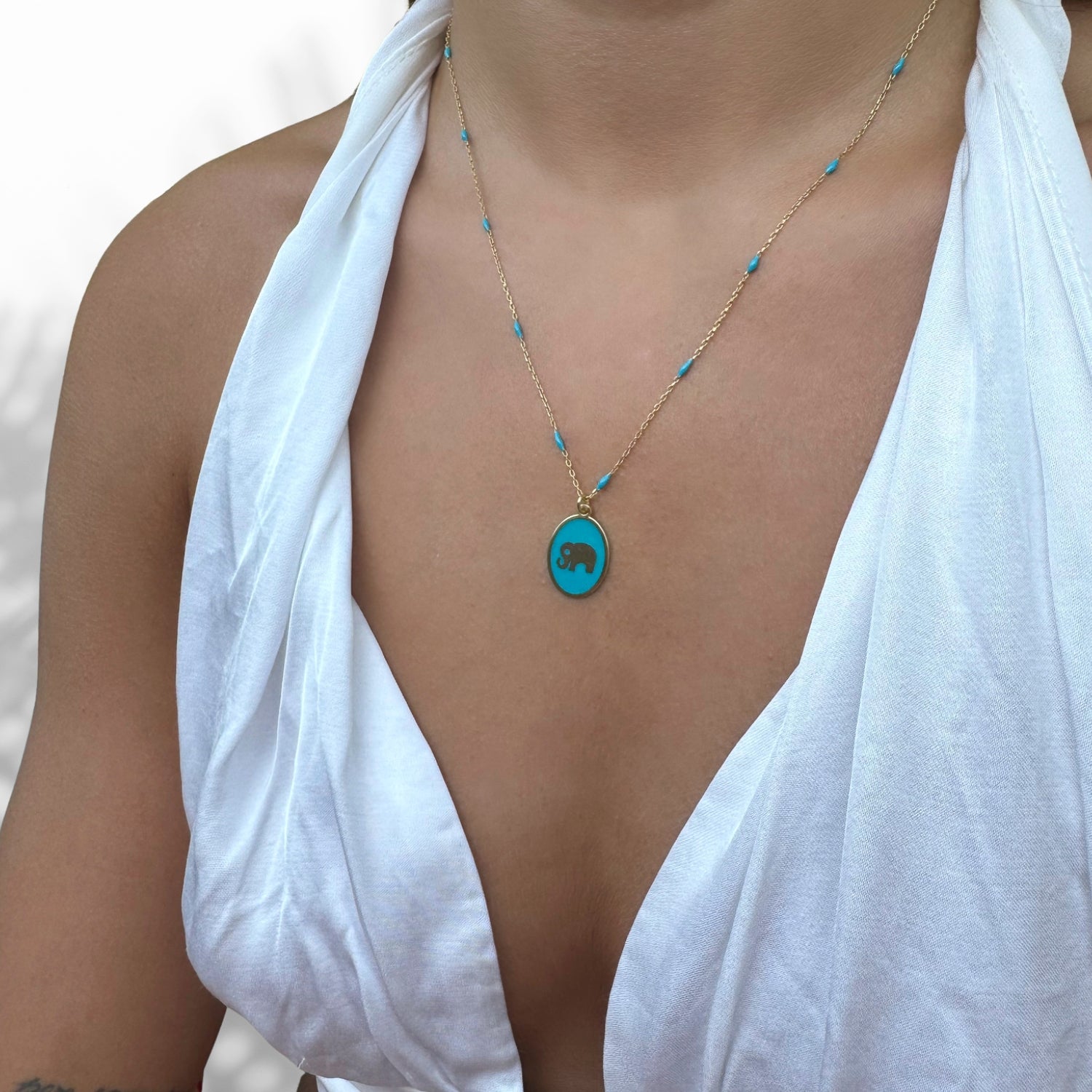Model Wearing Sterling Silver Elephant Pendant Necklace with Gold Plating