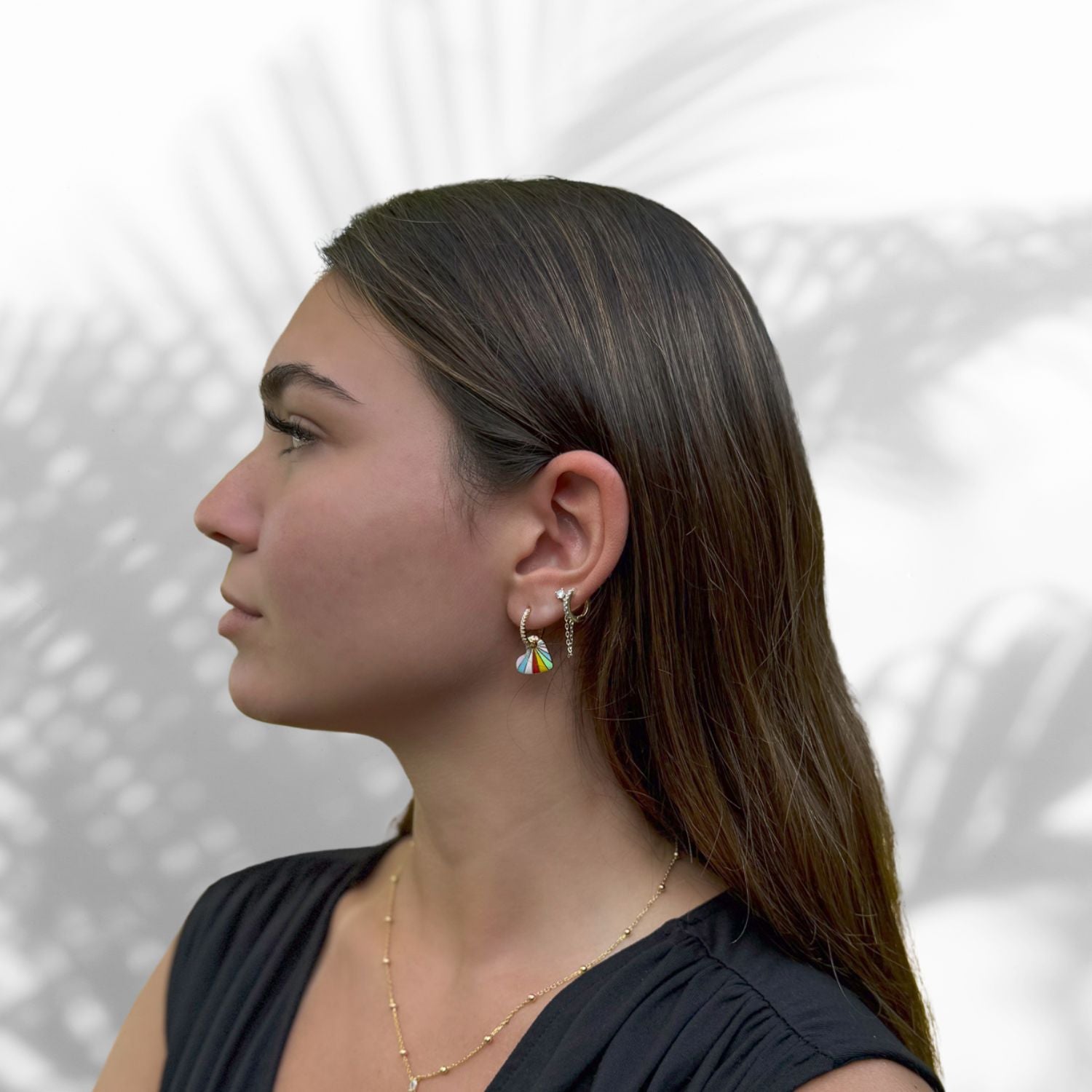 Model Wearing Fun Rainbow Enamel Heart Earrings with CZ Diamonds