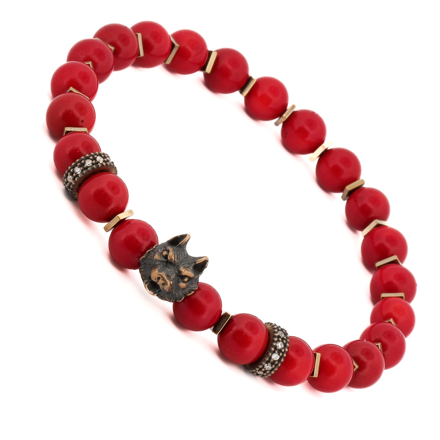 Handmade bracelet with red coral beads, bronze wolf bead, and gold hematite spacers