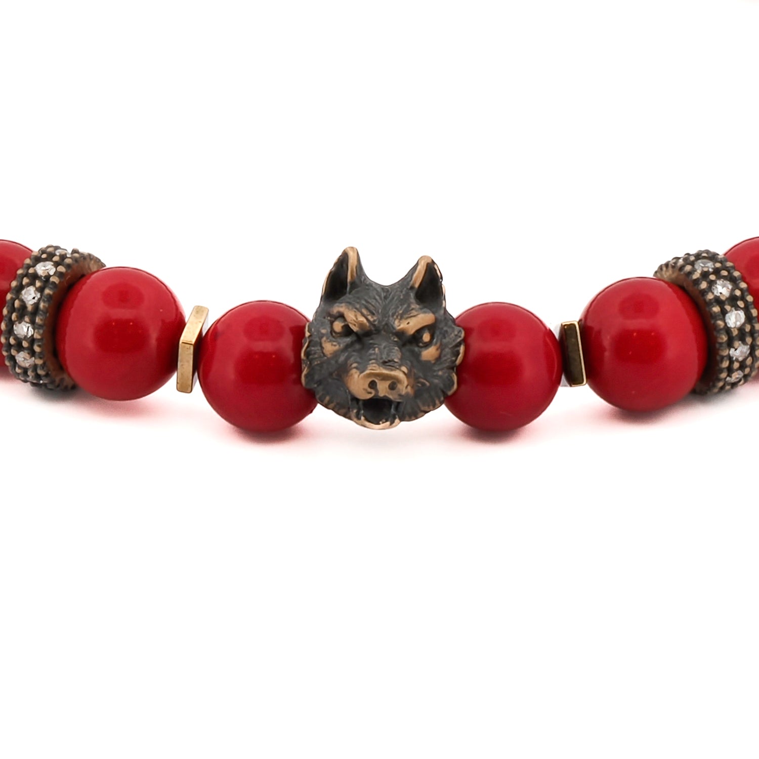 Men's bracelet featuring 8mm red coral beads and bronze wolf bead with gold hematite spacers