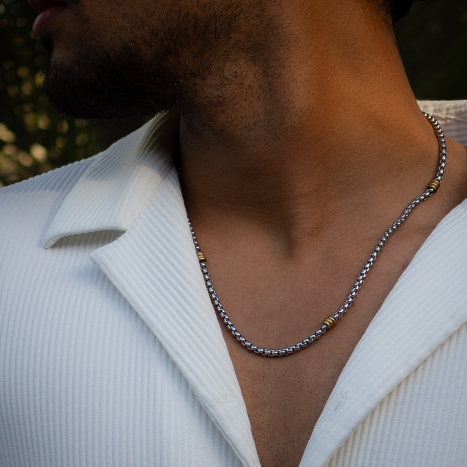 Bold silver and gold chain necklace for men, crafted from stainless steel with a polished finish.
