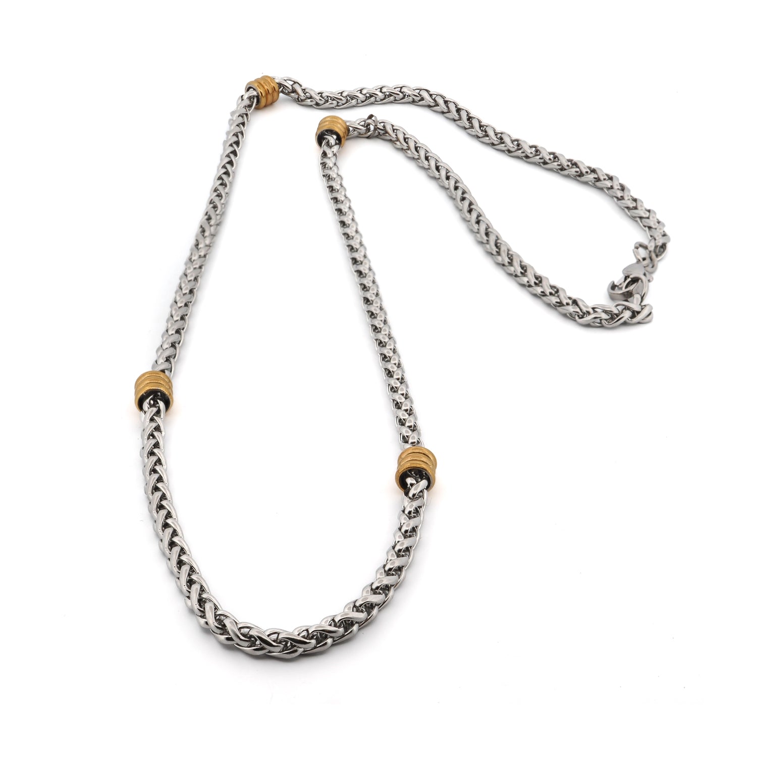 Stylish men's necklace with gold and silver links, designed for layering or standalone wear.