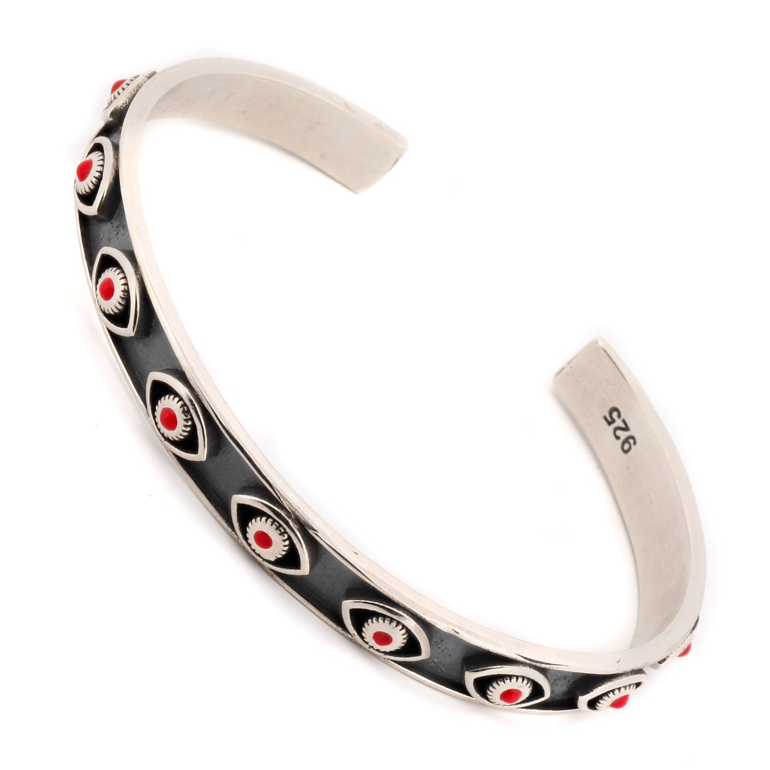 Coral evil eye symbol cuff bracelet, crafted in sterling silver