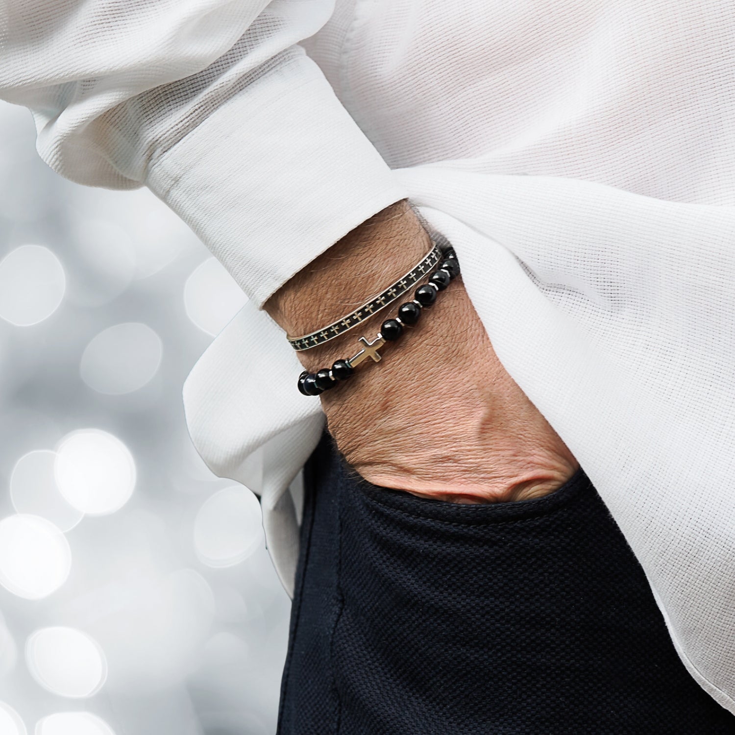 Unisex silver cuff bracelet featuring detailed cross motifs