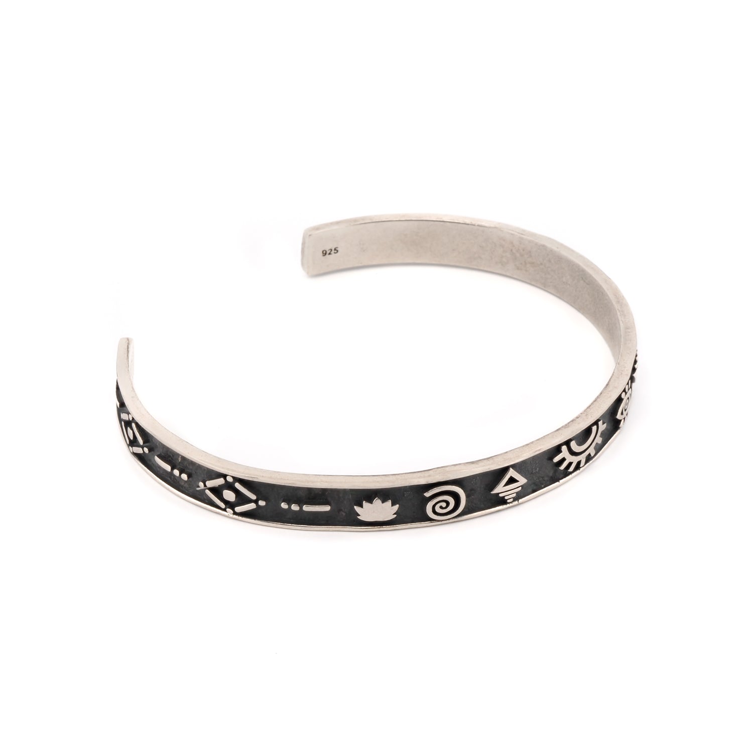 Sterling silver cuff bracelet with detailed spiritual engravings