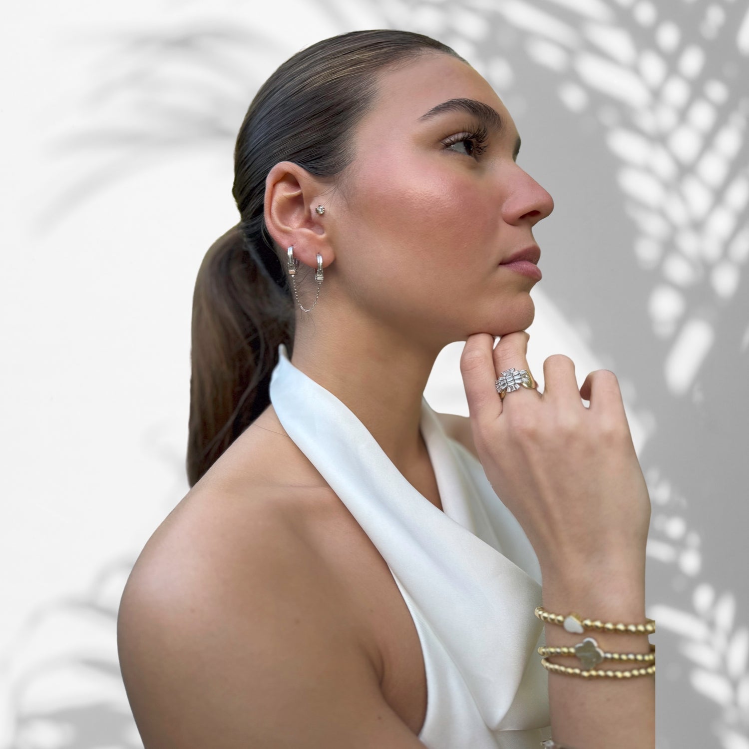 Close-up of Model Wearing Bold Double Pierced Earrings
