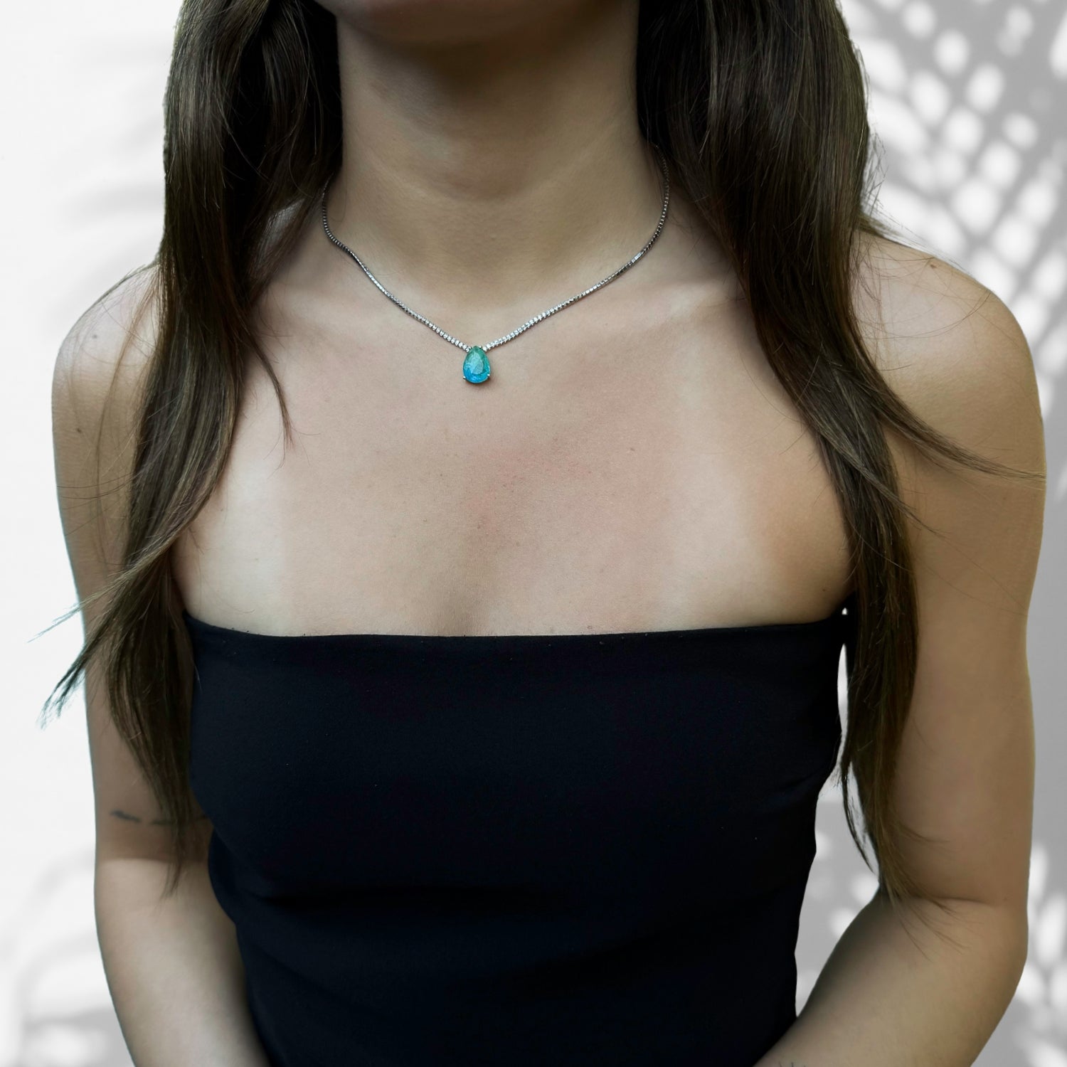 Model Wearing Rare and Vivid Beauty: Paraiba Tourmaline in Handcrafted Necklace