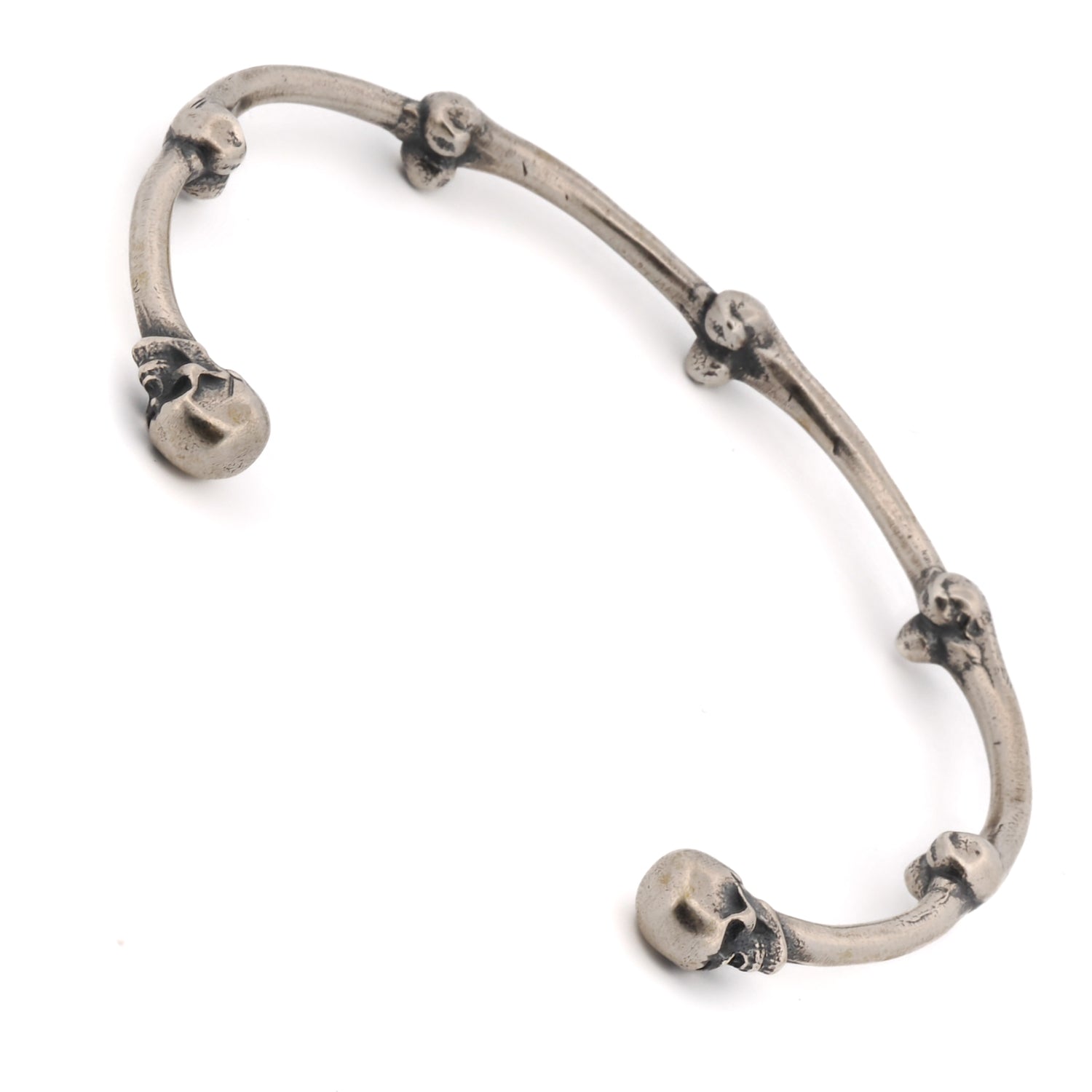 Skull-themed sterling silver cuff bracelet for a bold fashion statement
