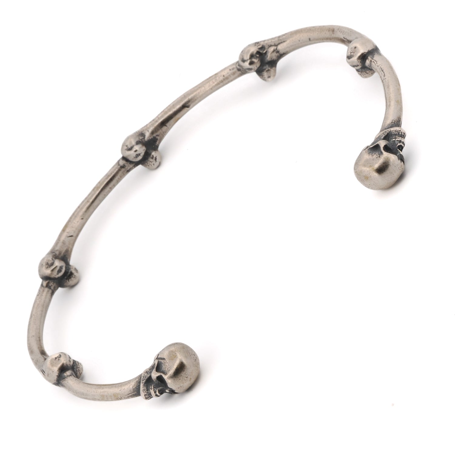 Handmade sterling silver cuff bracelet with a unique skull motif