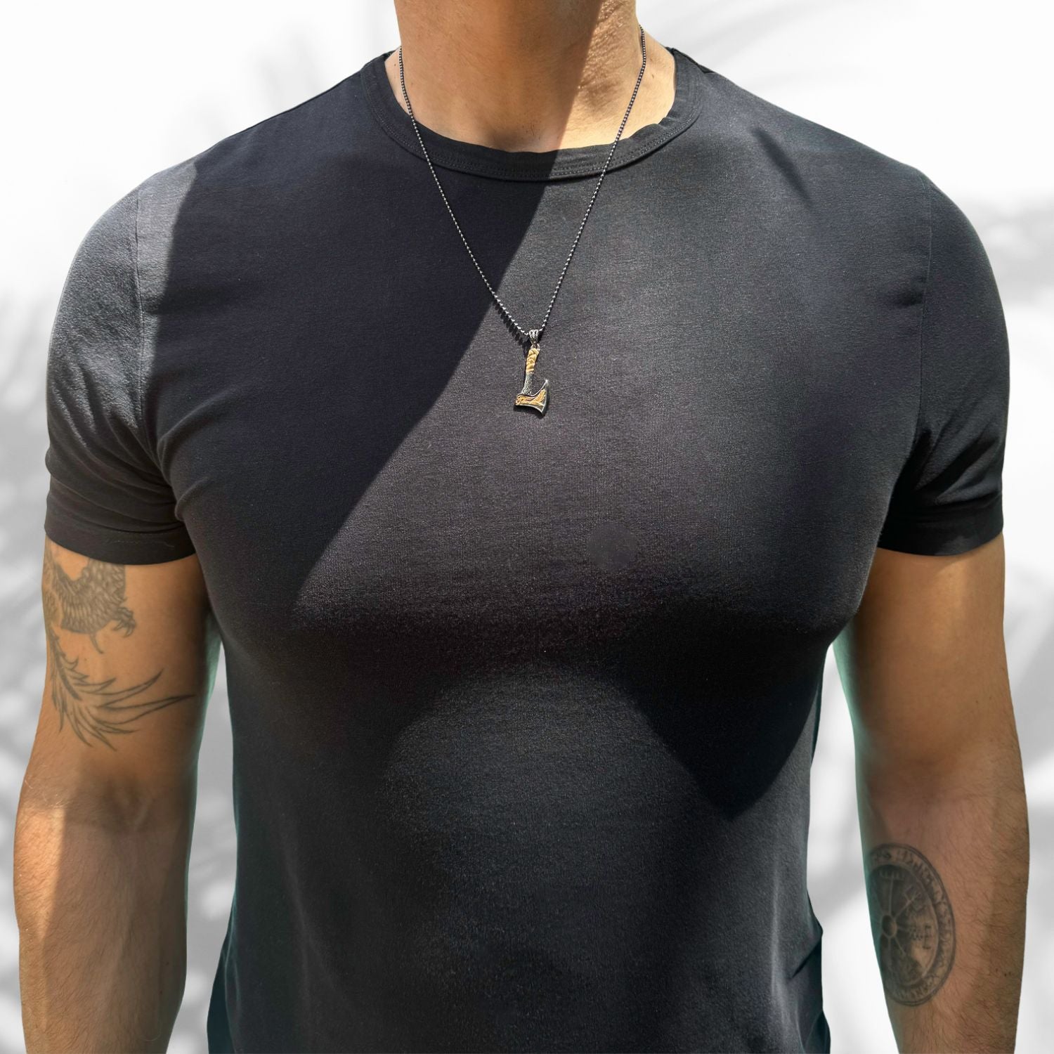 Viking warrior axe pendant necklace in 24k gold-plated sterling silver on a 25" silver chain.