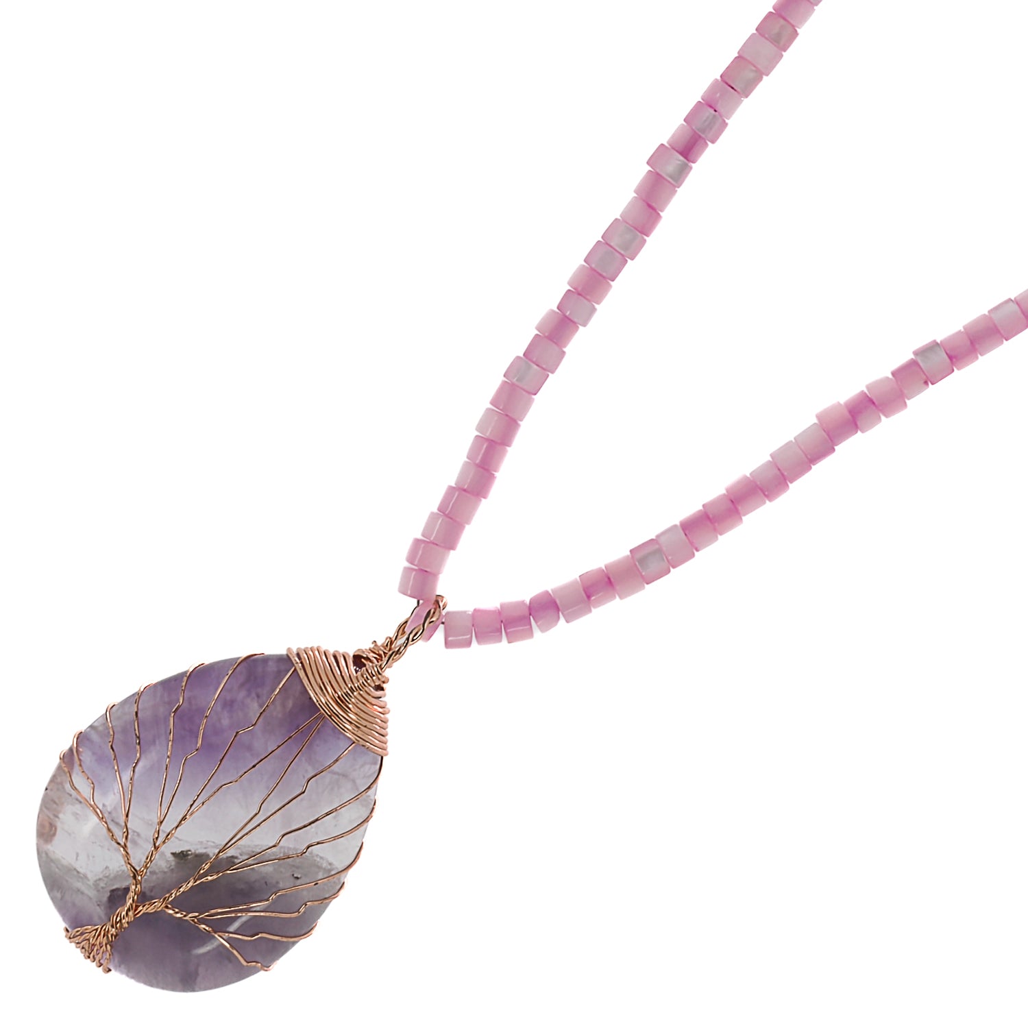 Embrace the harmony of nature with the Amethyst Healing Tree Necklace, a handmade jewelry piece that embodies elegance and spirituality.