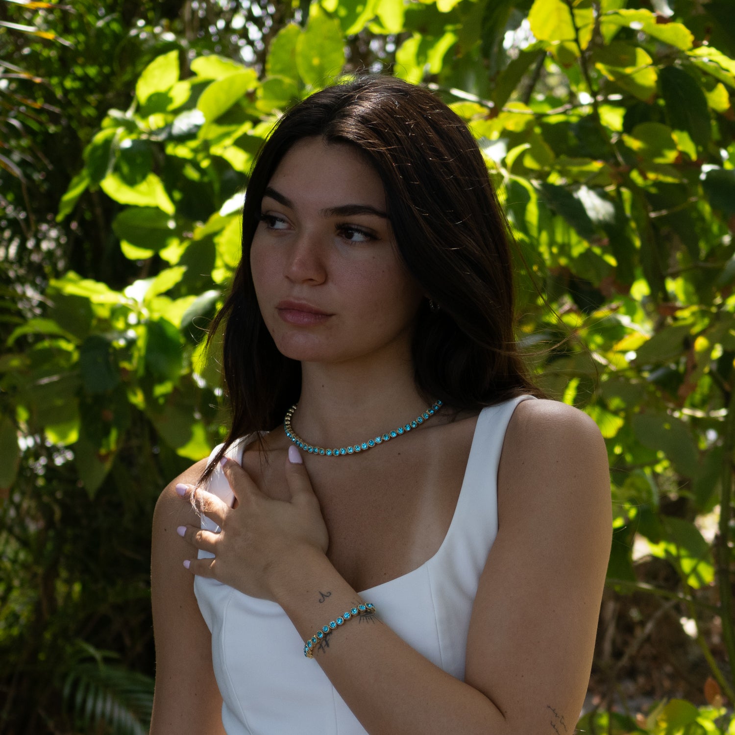 Aquamarine Tennis Bracelet with Gold-Plated Mystic Details, Symbolizing Clarity, Courage, and Peace