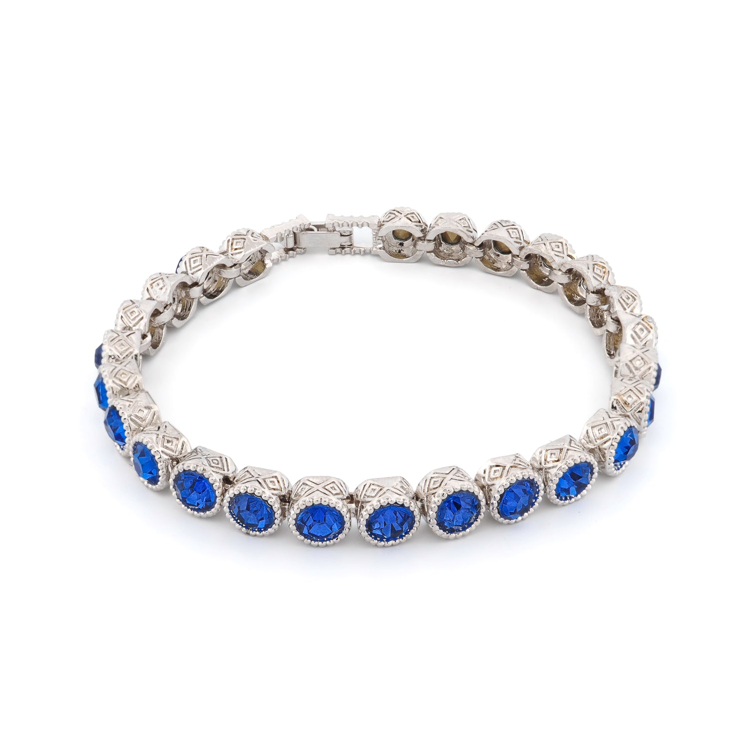 Handmade Blue Sapphire Tennis Mystic Silver Bracelet with Silver-Plated Bronze and Intricate Mystic Engravings