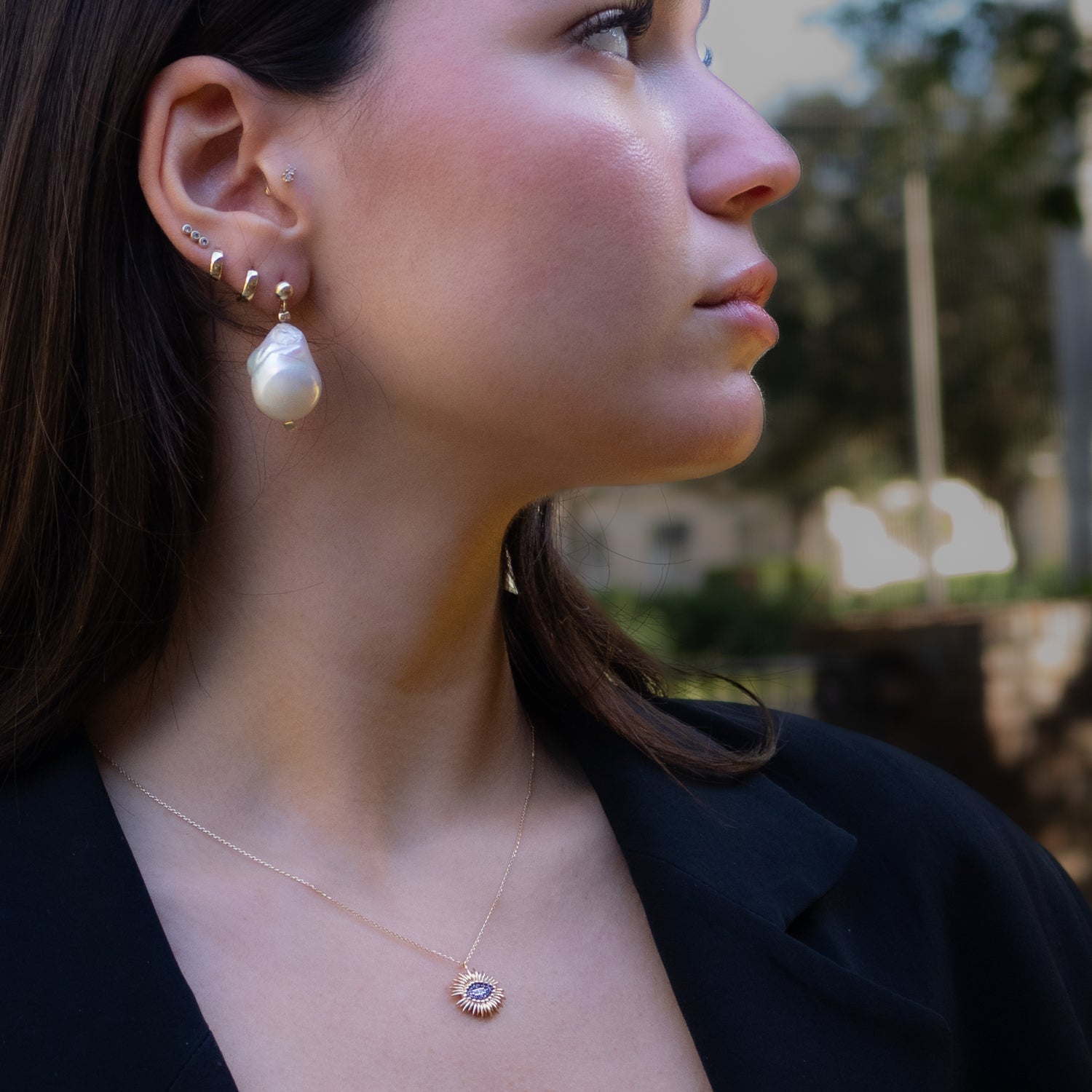 Large organic-shaped baroque pearl earrings in gold
