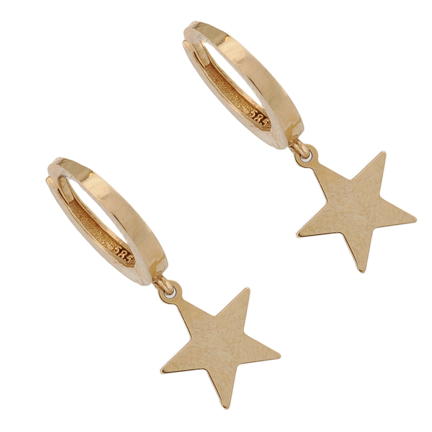 Close-up of gold star hoop earrings symbolizing guidance and inspiration