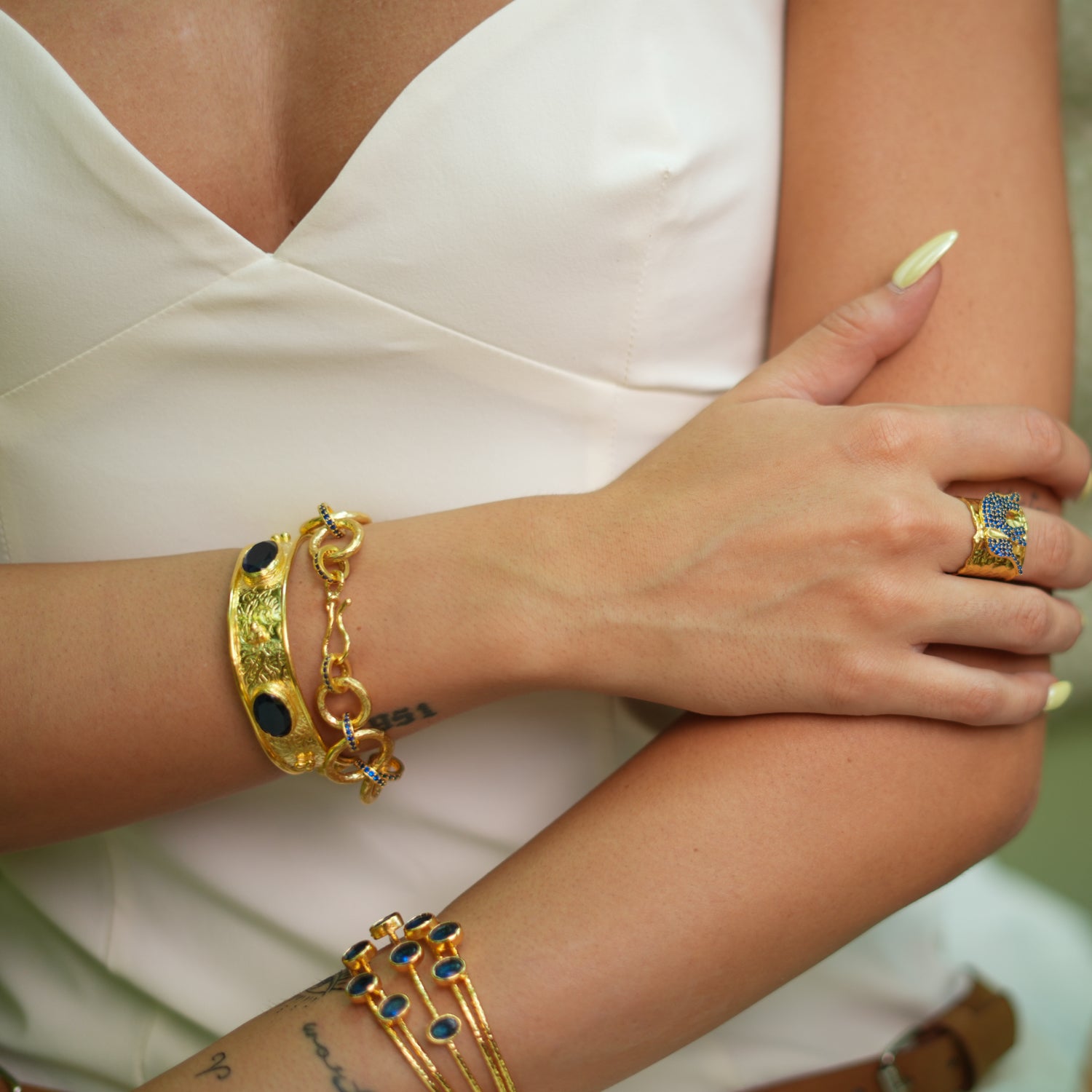 Gold-Plated Cleopatra Cuff Bracelet with Sapphire Gemstones for High-Energy Elegance
