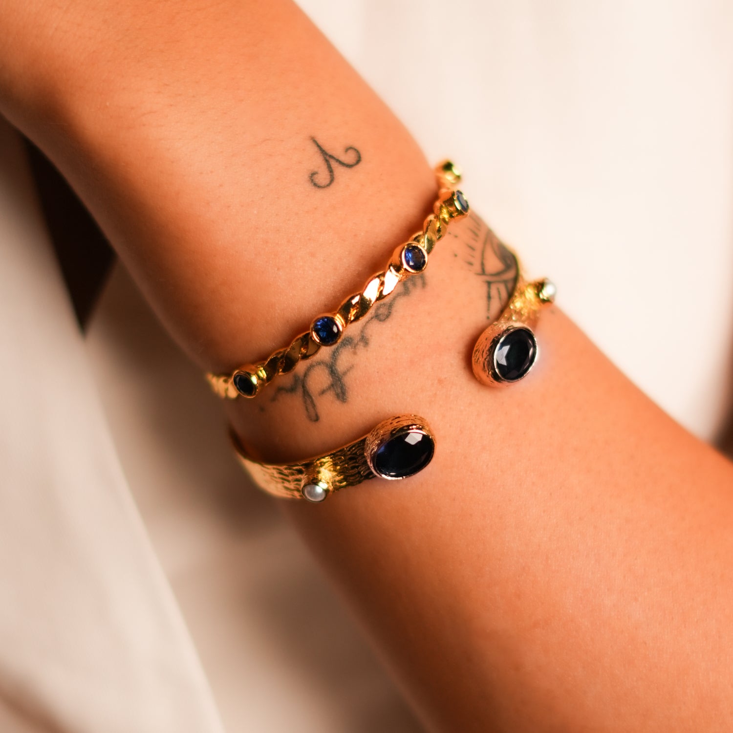 Handcrafted 24K Gold Cuff Bracelet with Sapphire Stones and Pearls for Refined, Elegant Style