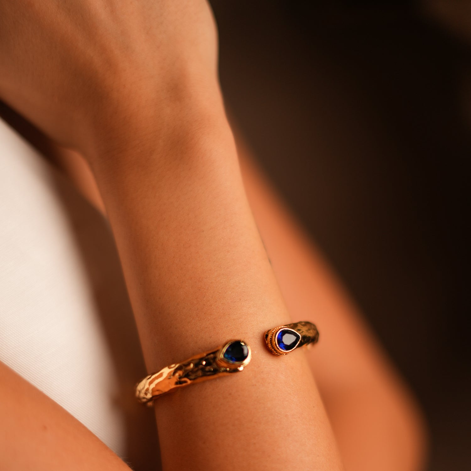 Gold-Plated Chunky Cuff Bracelet with Sapphire Stones for a Statement of Royalty and Beauty