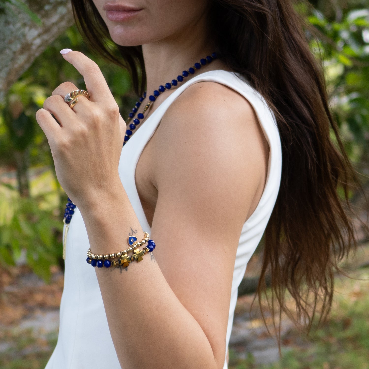 Elegant spiritual bracelet set blending blue crystal energy and gold symbolism