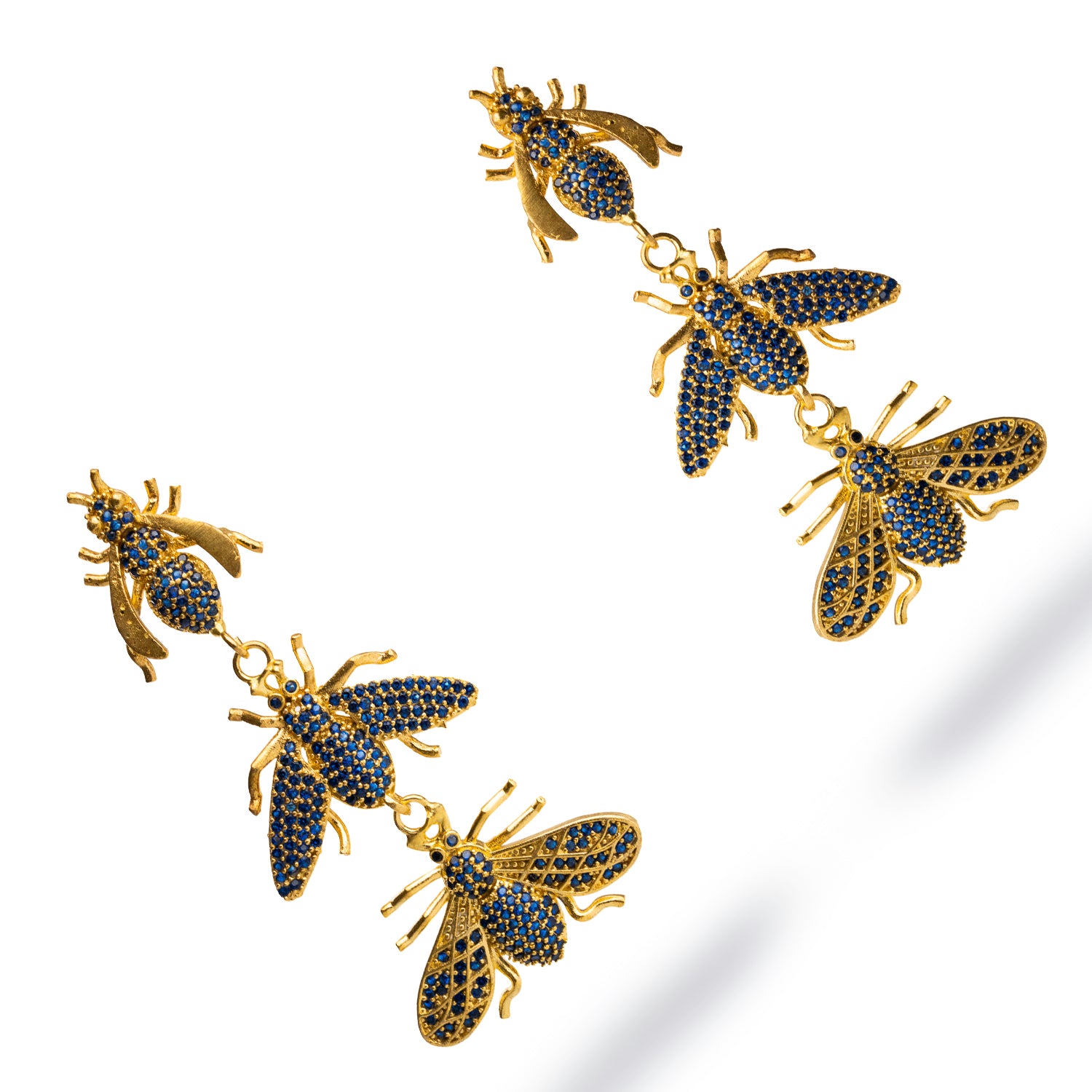 Chic 24k gold-plated earrings with descending queen bee motifs, adorned with sapphire stones, perfect for a striking and confident look.