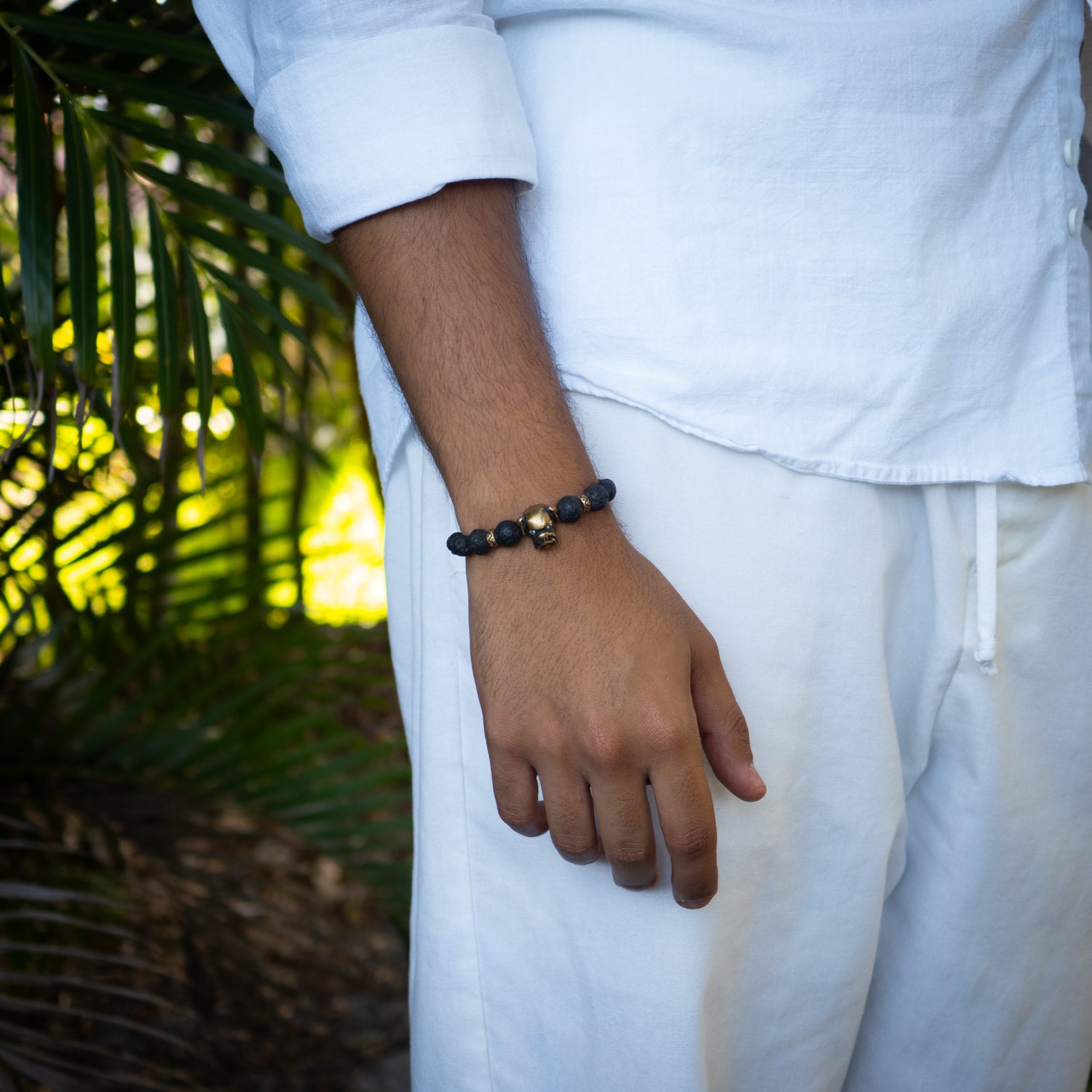 Statement bracelet featuring 8mm lava rock stones, tiger eye beads, and gold hematite spacers.