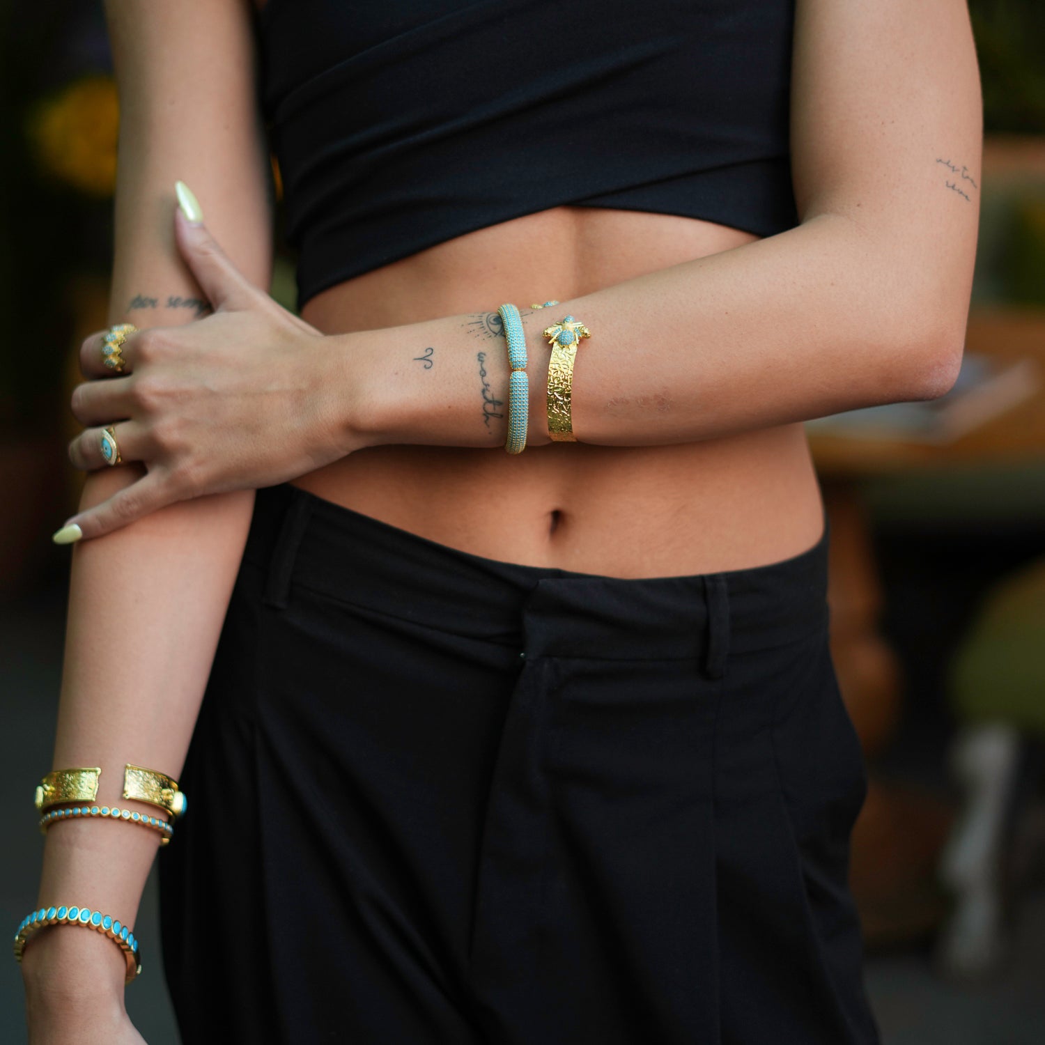 24K Gold-Plated Bangle with Radiant Turquoise Stones for a Bold and Sophisticated Look