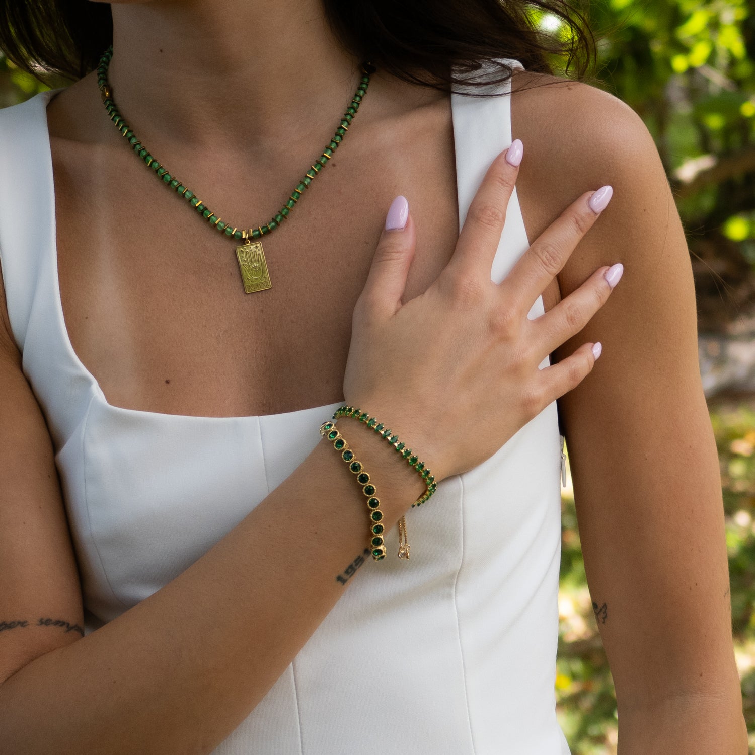 Handmade 18K gold plated bracelet with shimmering green emerald-cut crystals