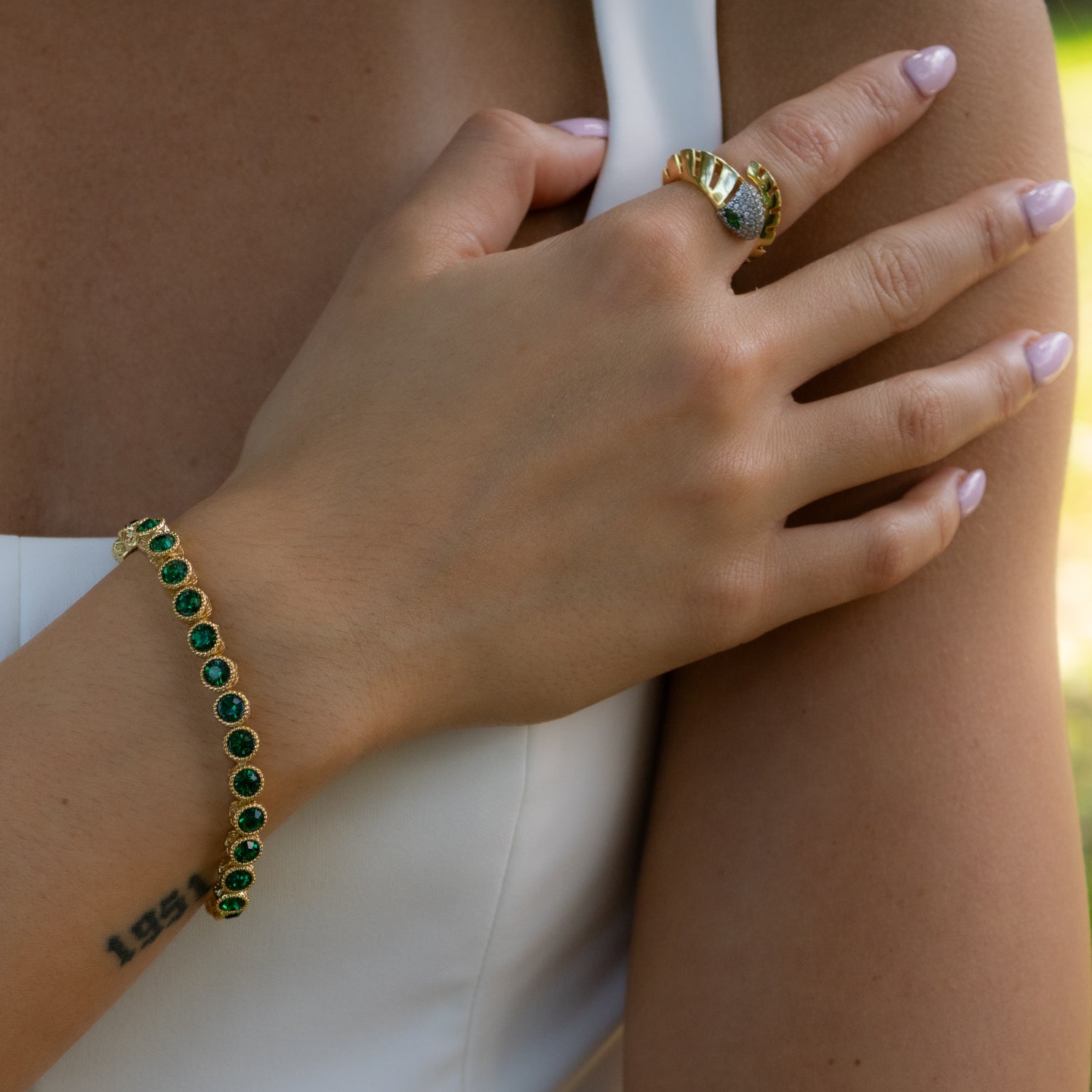 Vivid Emerald Stone Bracelet with Gold-Plated Mystic Details, Representing Growth and Inner Wisdom
