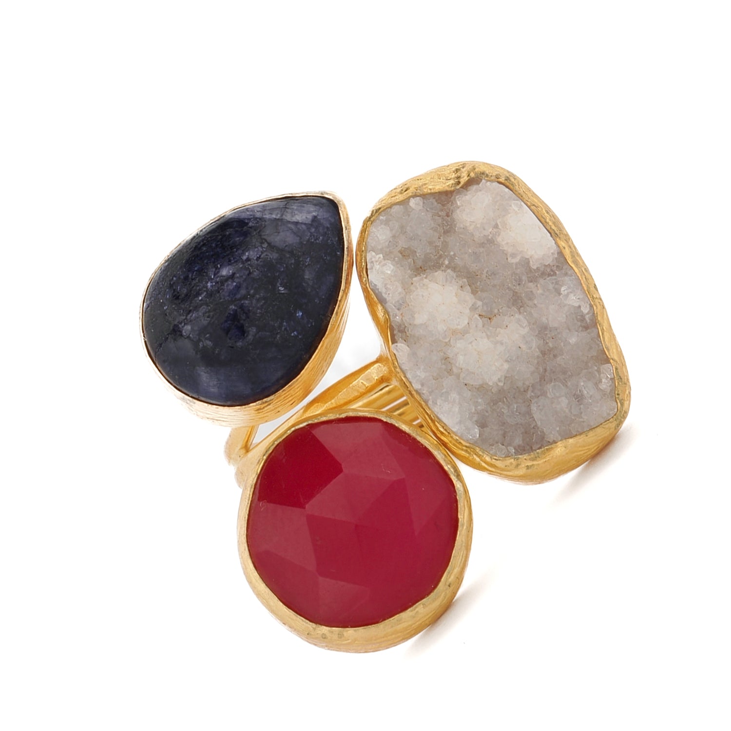Close-up of 24K gold-plated bronze ring with ruby, quartz, and amethyst for spiritual alignment