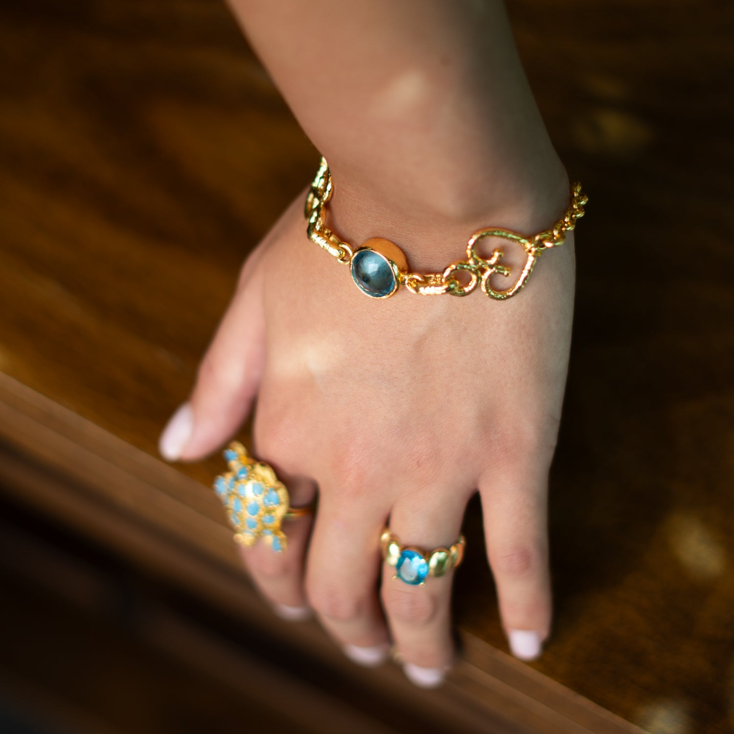 Eternal Love Blue Topaz Gold Adjustable Bracelet