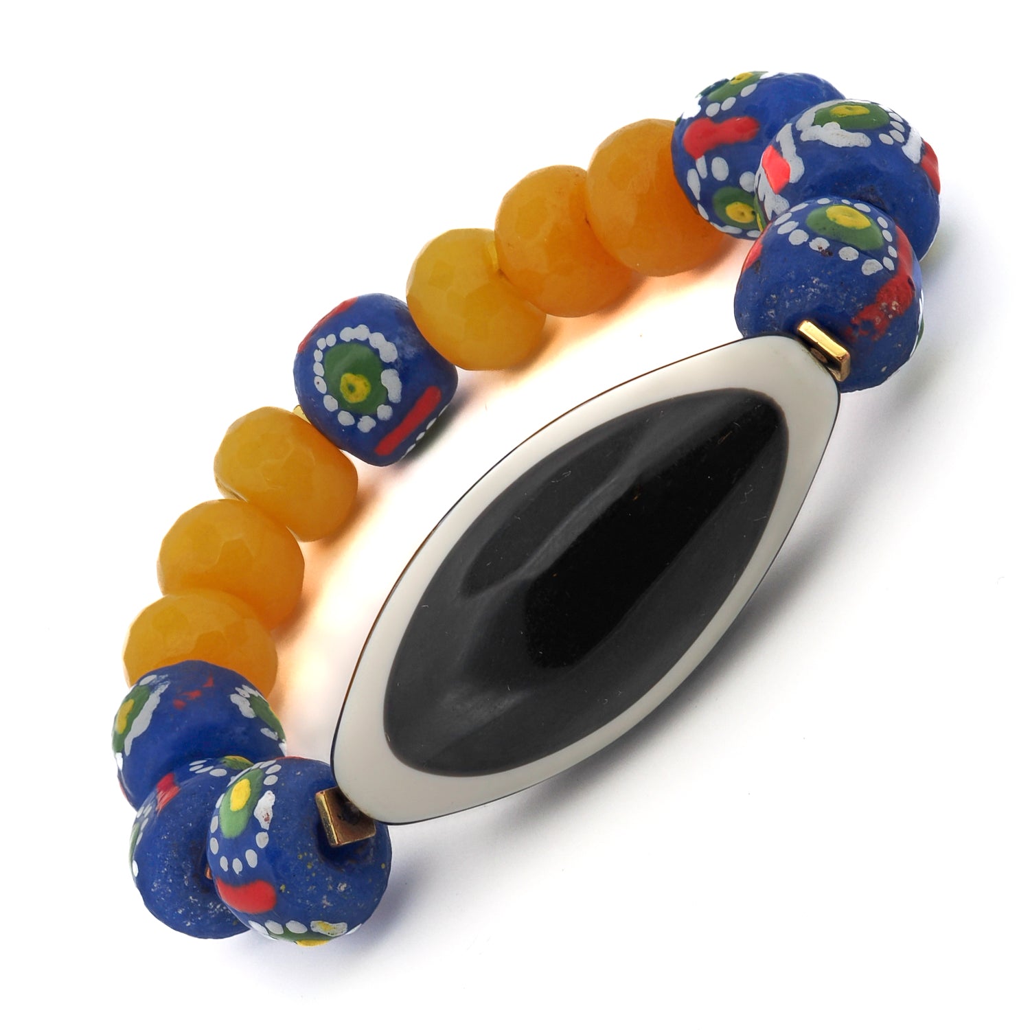 Unique handmade bracelet featuring chunky Evil Eye beads, vibrant yellow jade, and a Nepal Eye centerpiece.