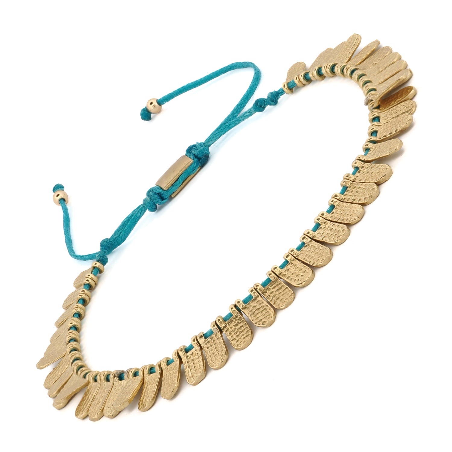 Adjustable Fish Scale Turquoise Bracelet with gold accents, perfect for layering or wearing alone.