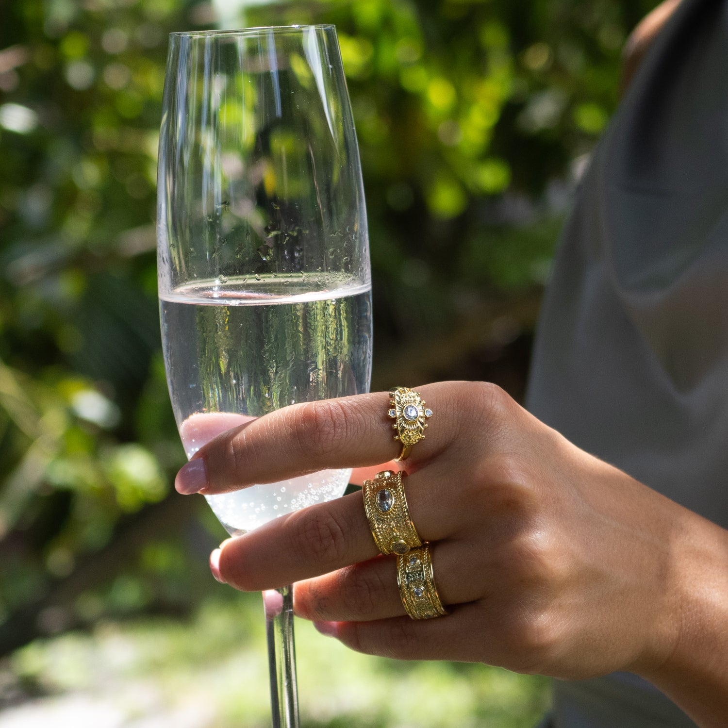 Adjustable gold ring from Cleopatra Collection adorned with CZ diamonds for clarity and strength.