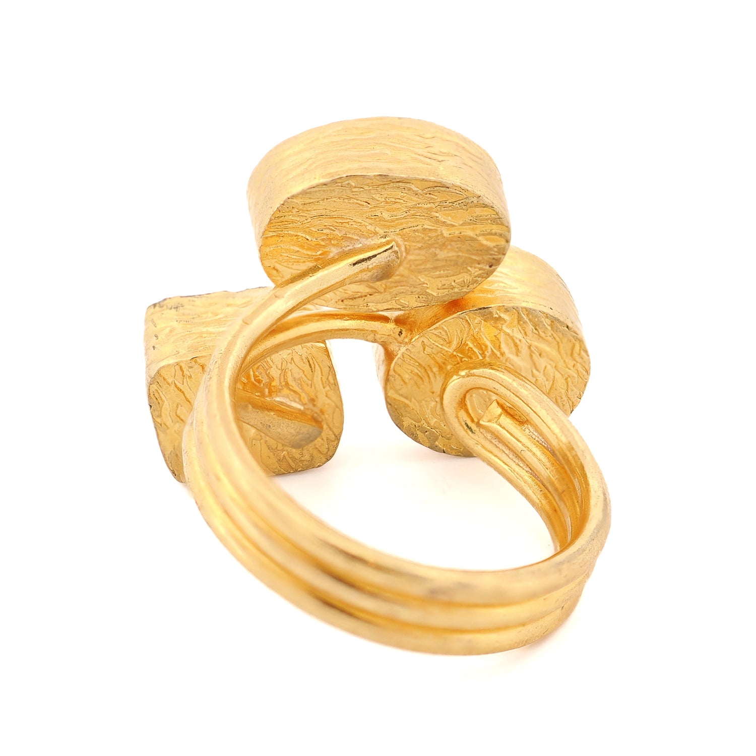 Close-up of 24K gold-plated bronze ring with unique oval, round, and square gemstone cuts