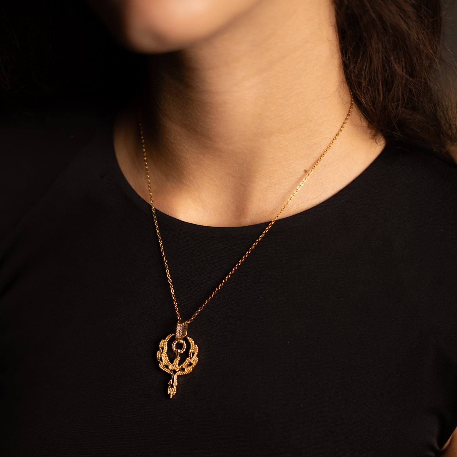 Water-resistant stainless steel phoenix necklace with CZ sparkle